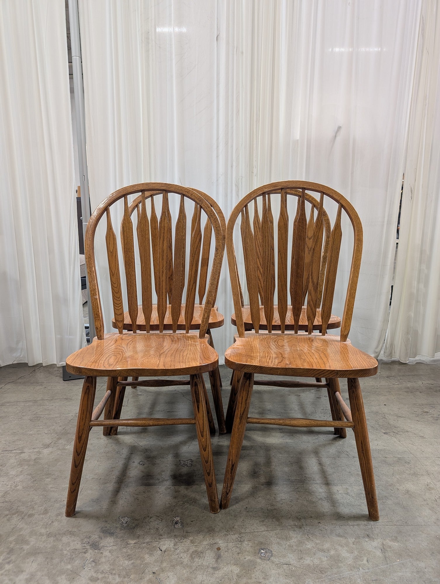 Four Arrowback Windsor Dining Chairs in Wood