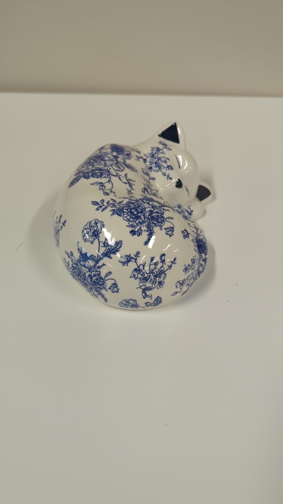 Charming Blue and White Floral Ceramic Sleeping Cat Figurine