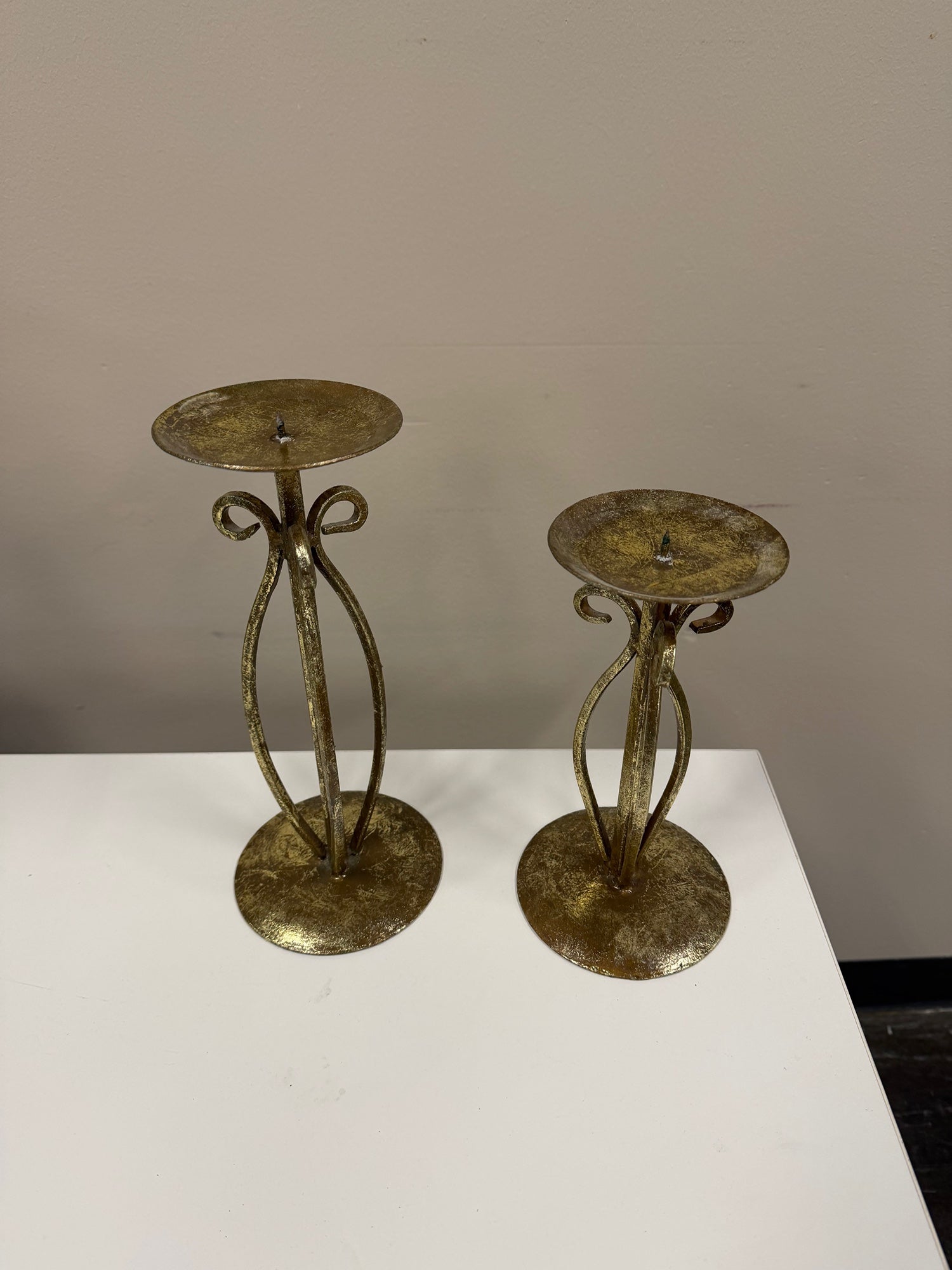 Pair of Decorative Gold-Tone Metal Candle Holder with Scrollwork Design