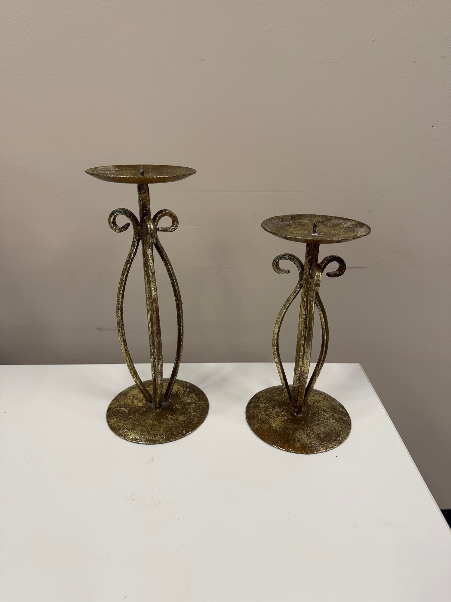 Pair of Decorative Gold-Tone Metal Candle Holder with Scrollwork Design