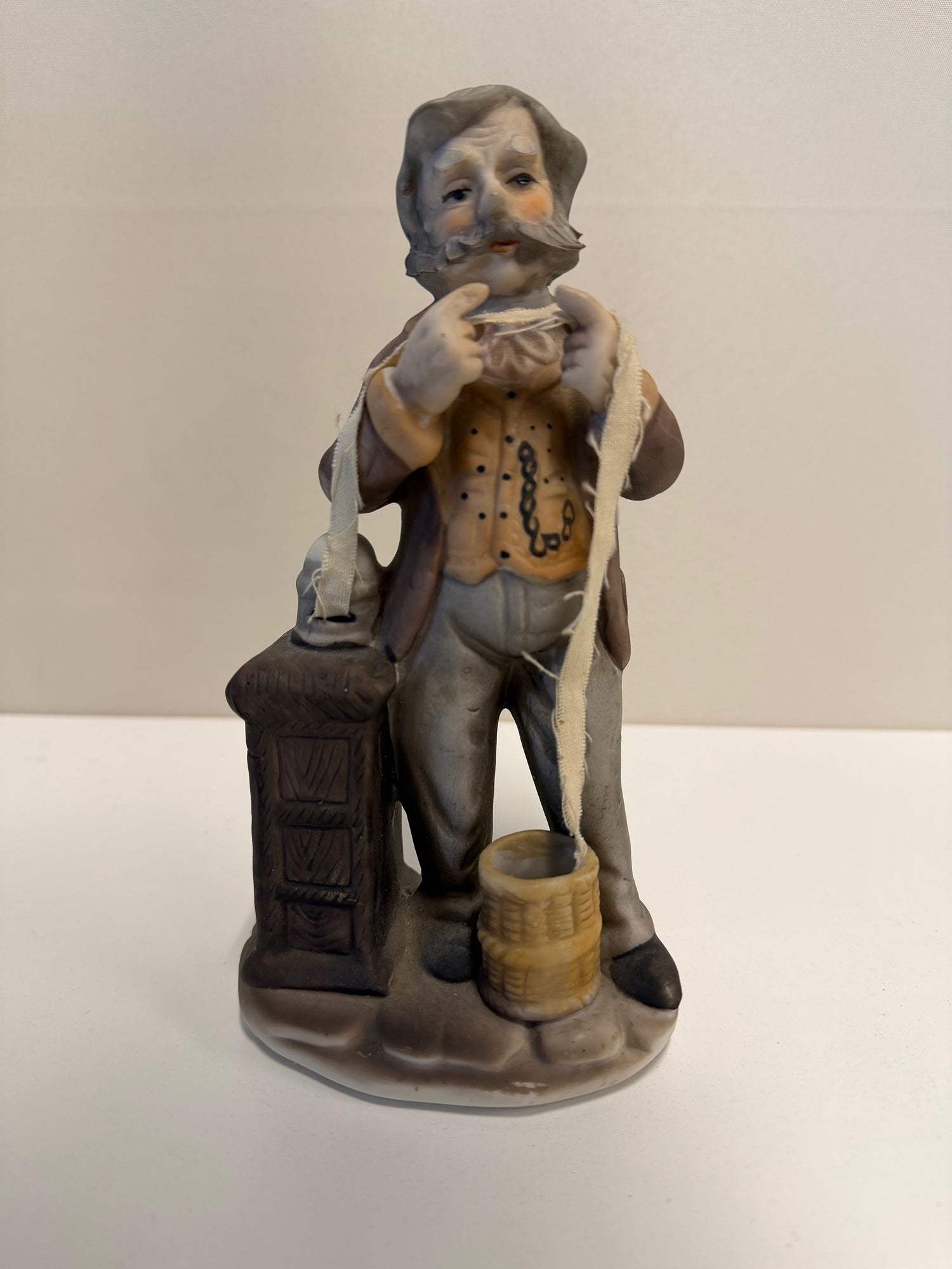 Vintage Ceramic Gentleman Figurine with Yarn and Basket