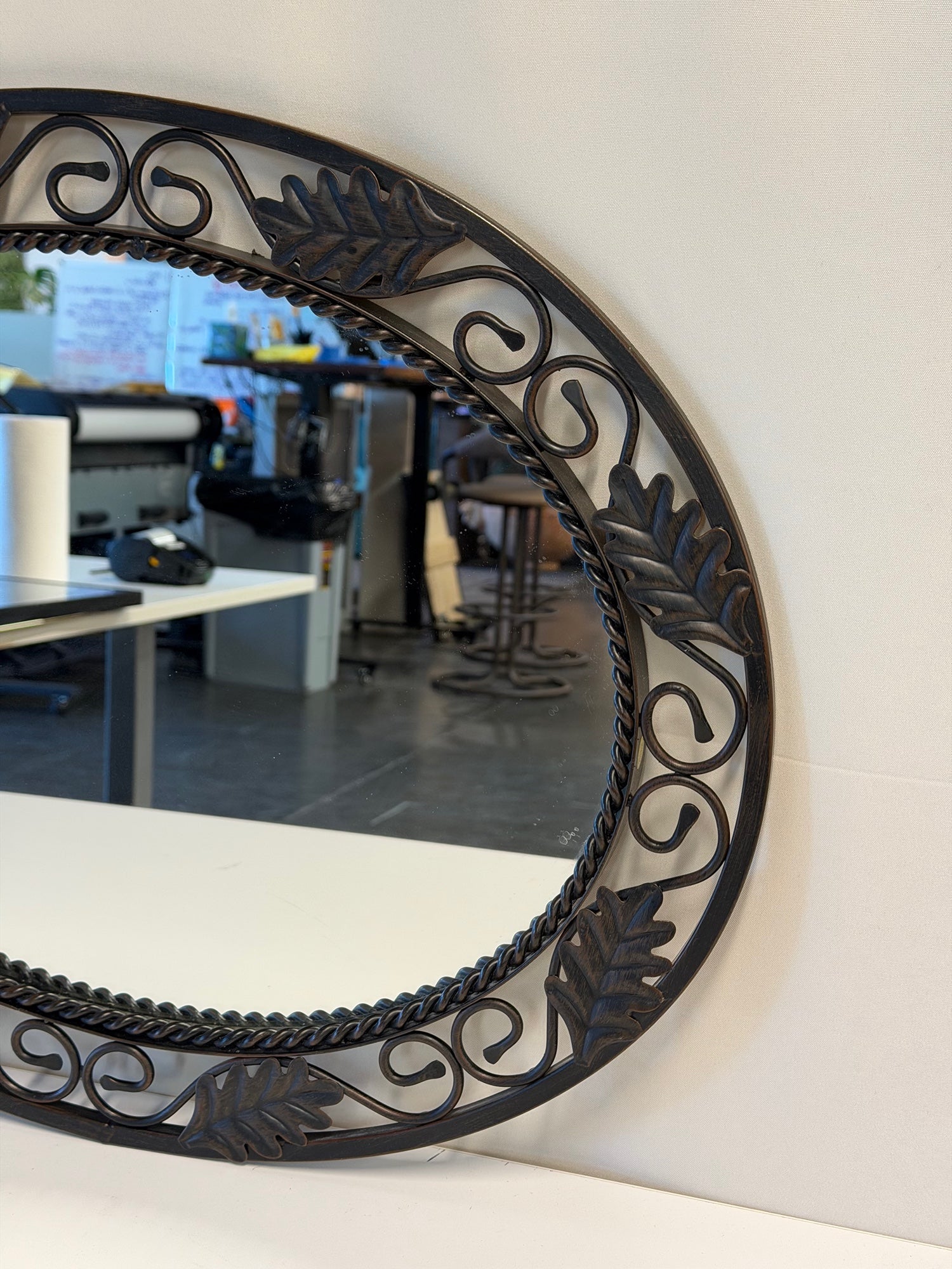 Ornate Oval Wall Mirror with Leaf and Scrollwork Frame