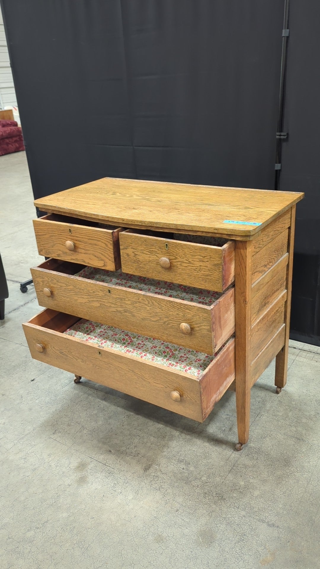 Light Oak Four-Drawer Dresser with Casters