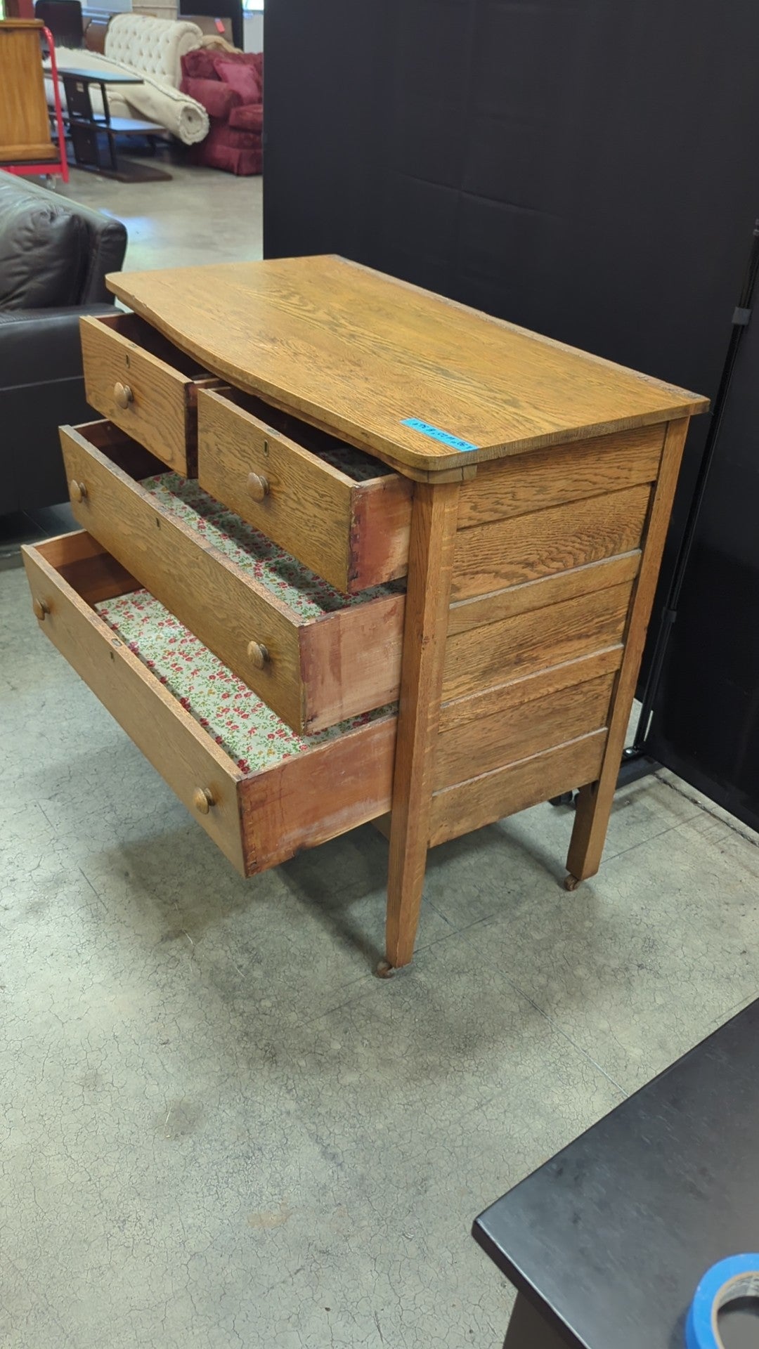 Light Oak Four-Drawer Dresser with Casters