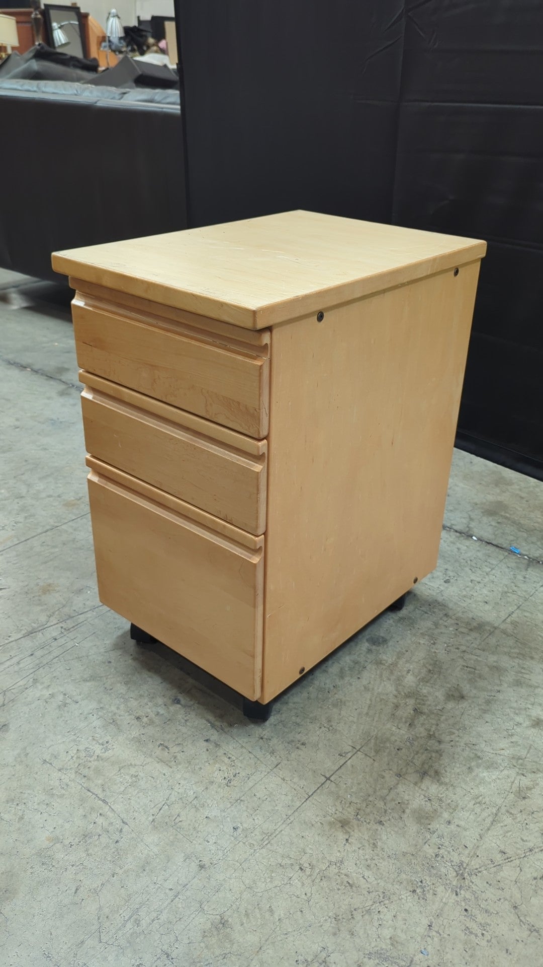 Light Wood Three-Drawer Cabinet with Casters