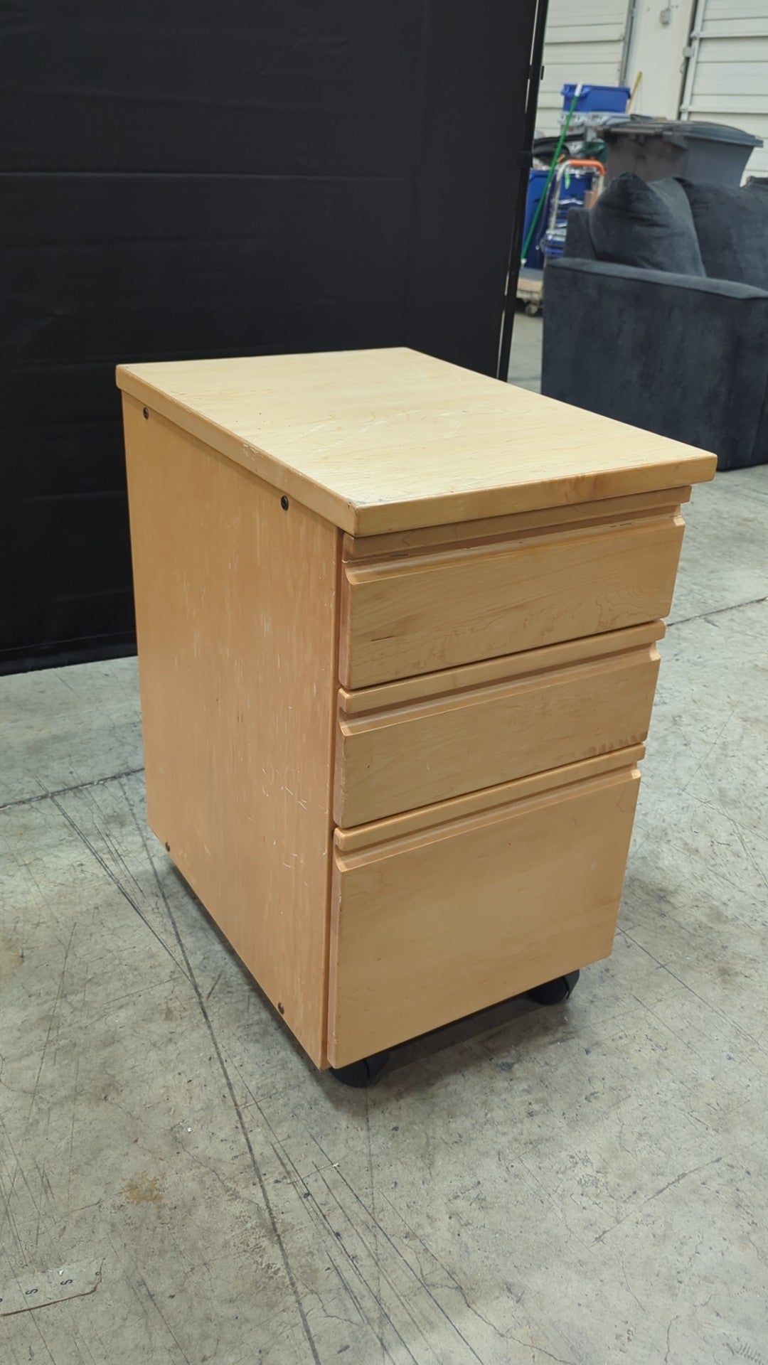 Light Wood Three-Drawer Cabinet with Casters