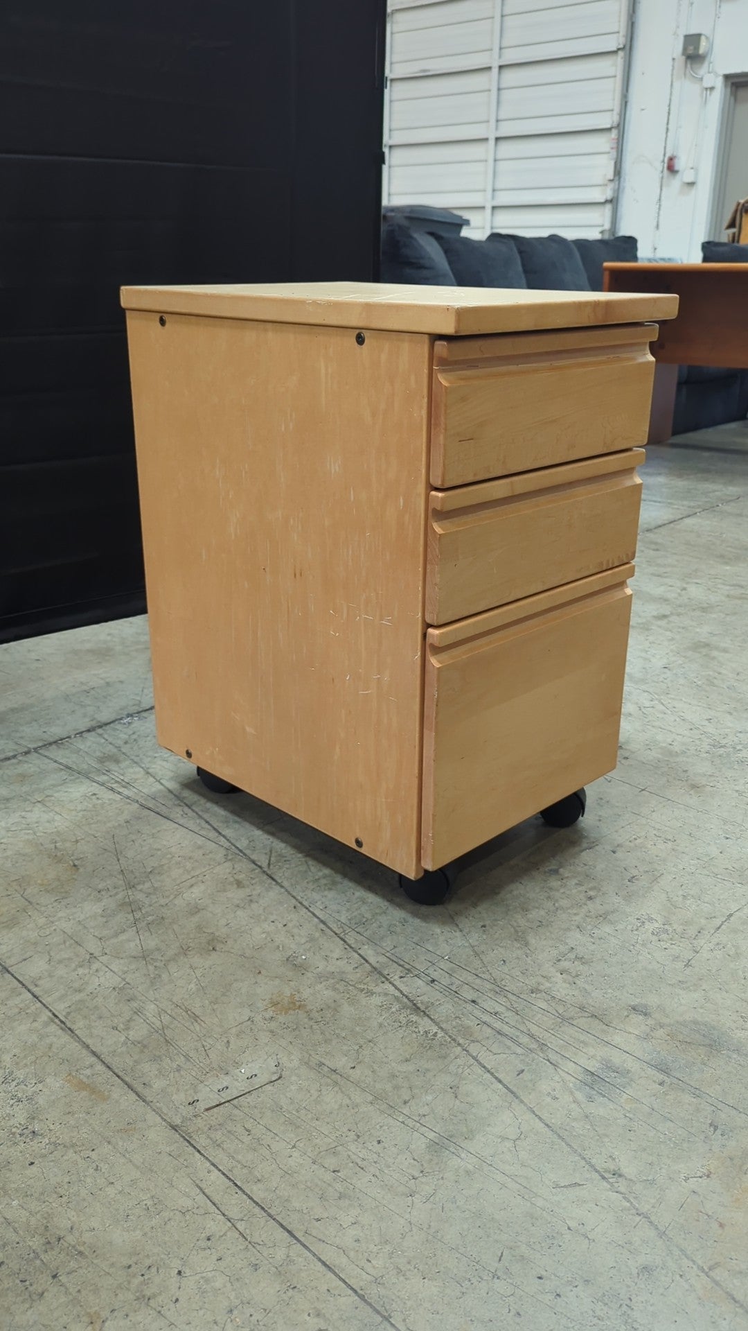 Light Wood Three-Drawer Cabinet with Casters
