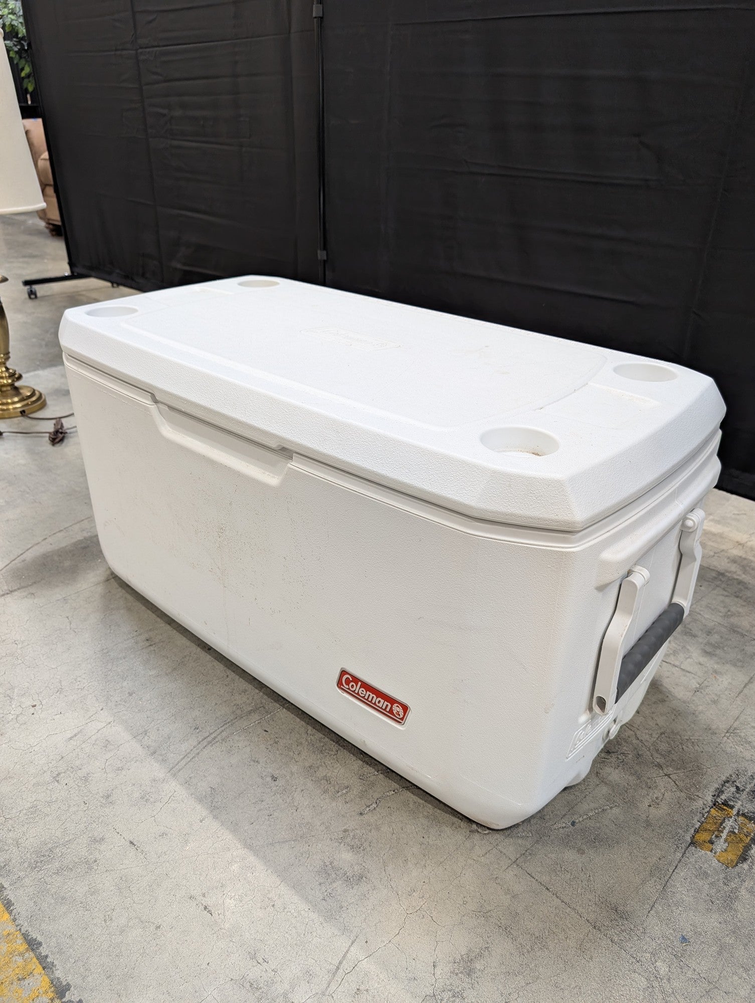 White Coleman Plastic Cooler with Cup Holders