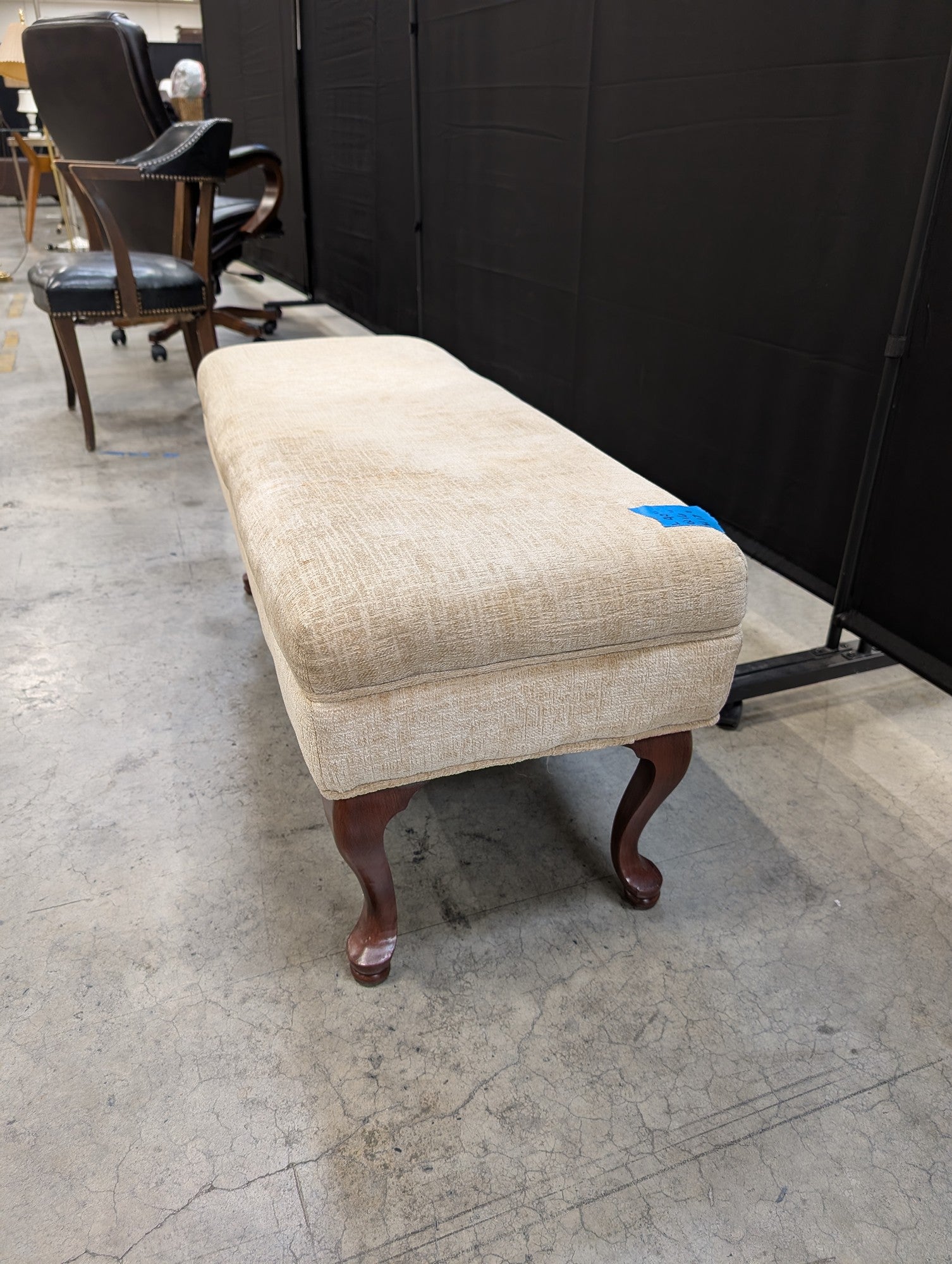 Beige Upholstered Ottoman with Cabriole Legs