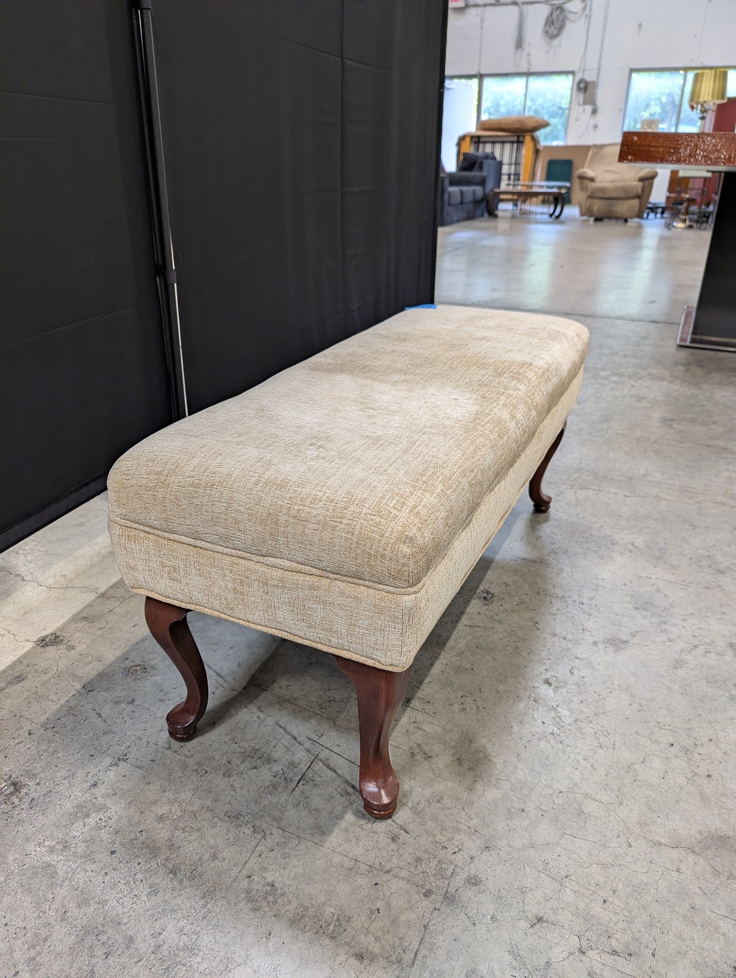 Beige Upholstered Ottoman with Cabriole Legs