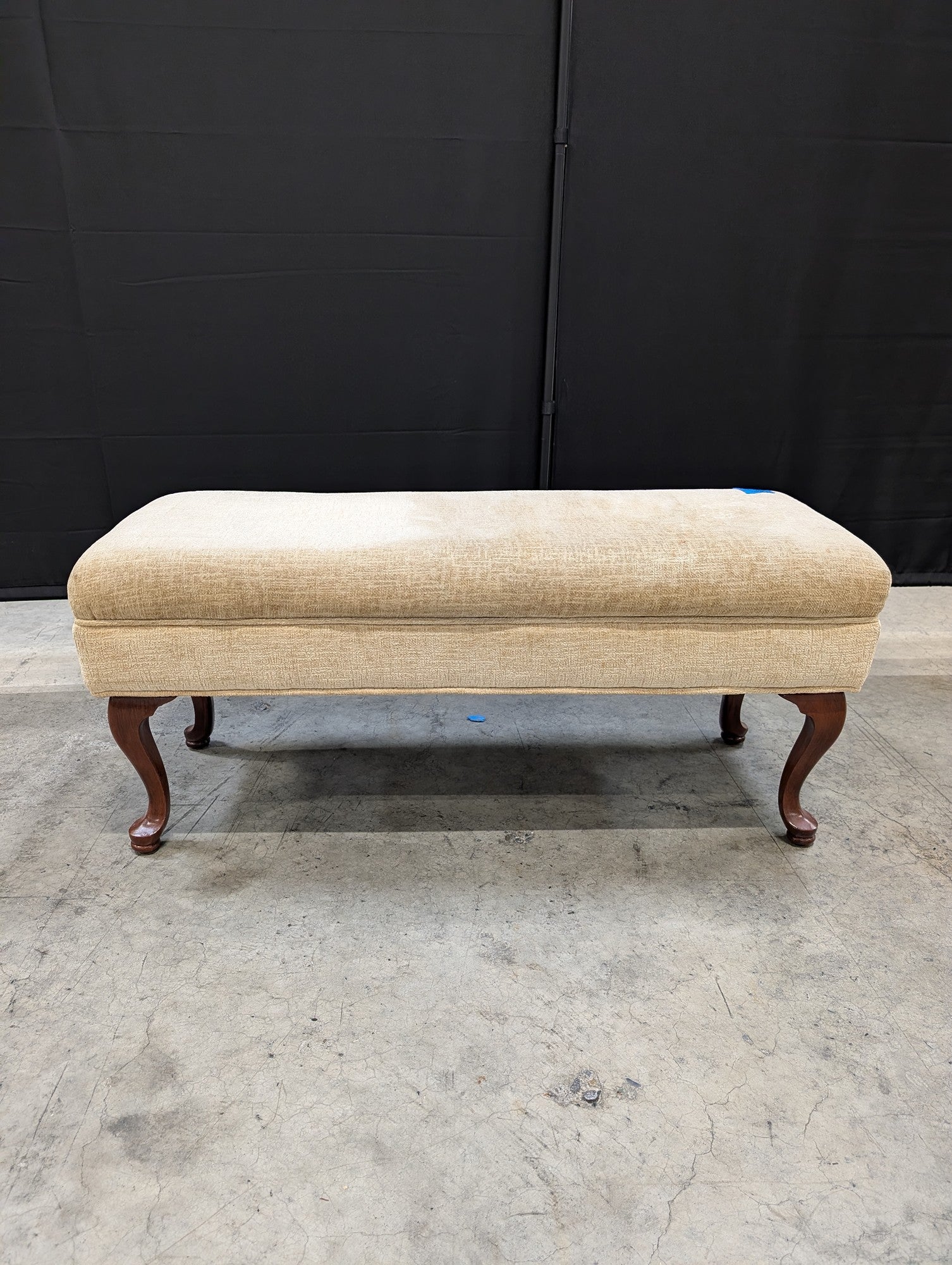 Beige Upholstered Ottoman with Cabriole Legs