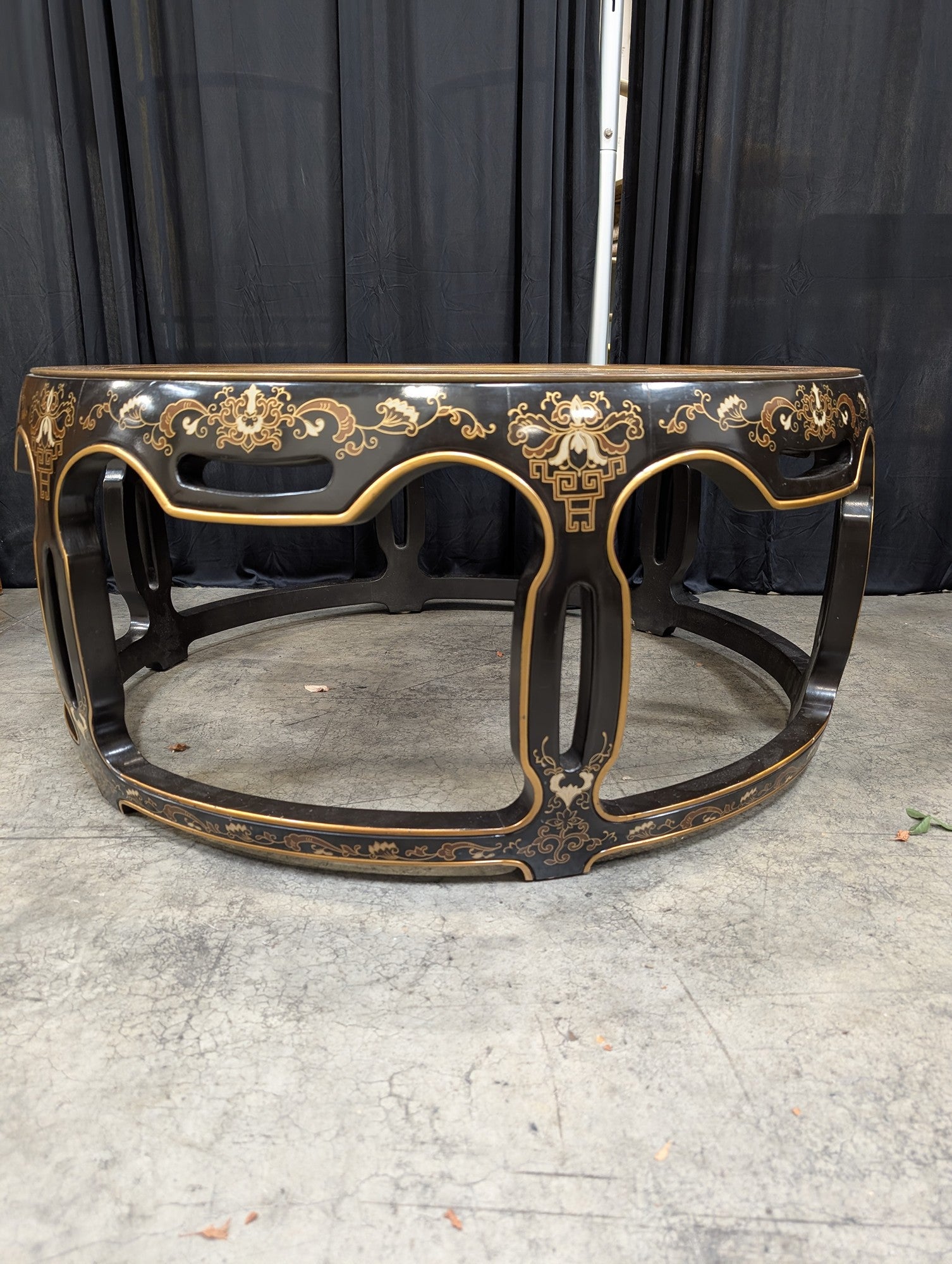 Ornate Black and Gold Round Coffee Table with Glass Top