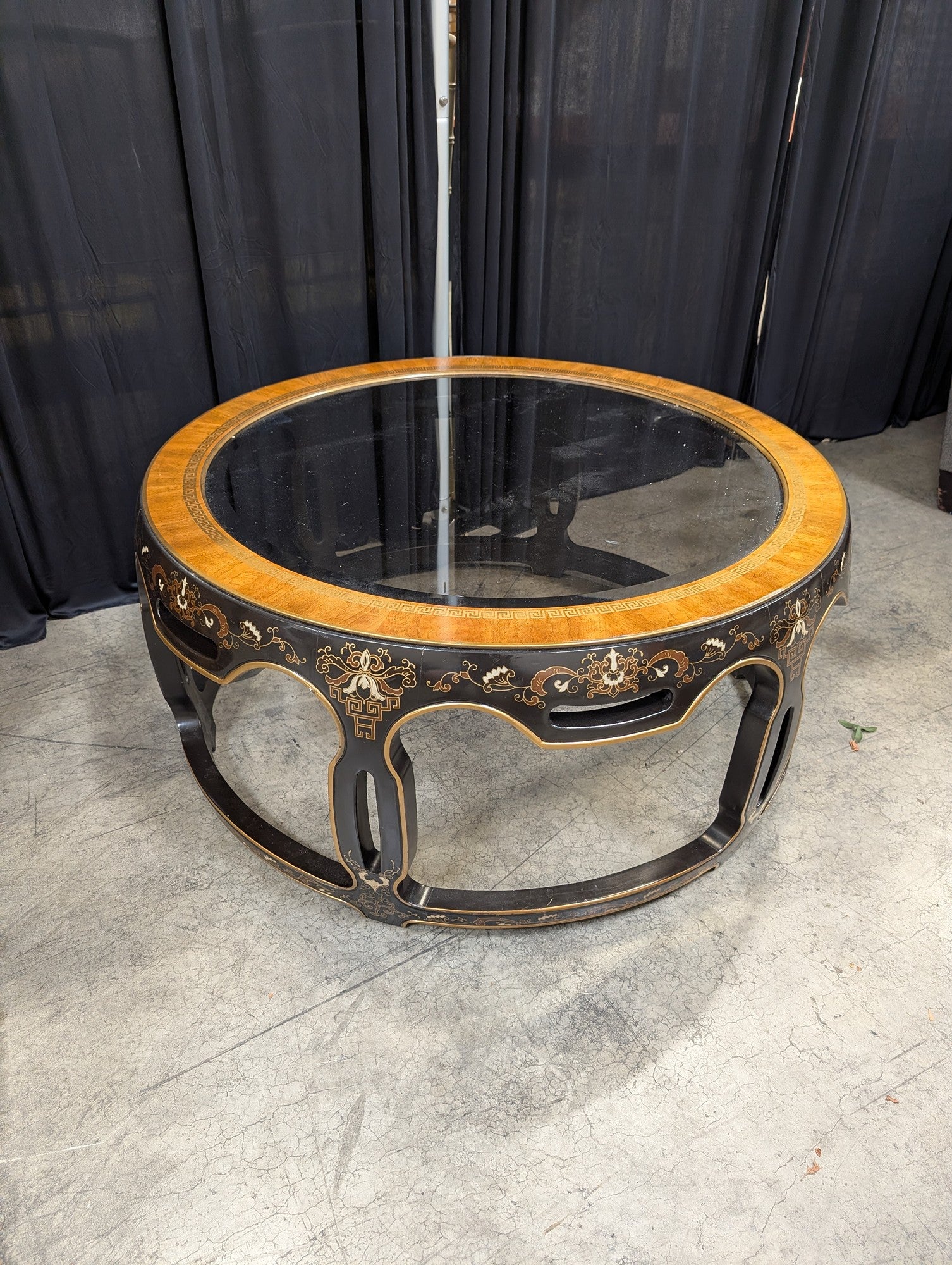 Ornate Black and Gold Round Coffee Table with Glass Top