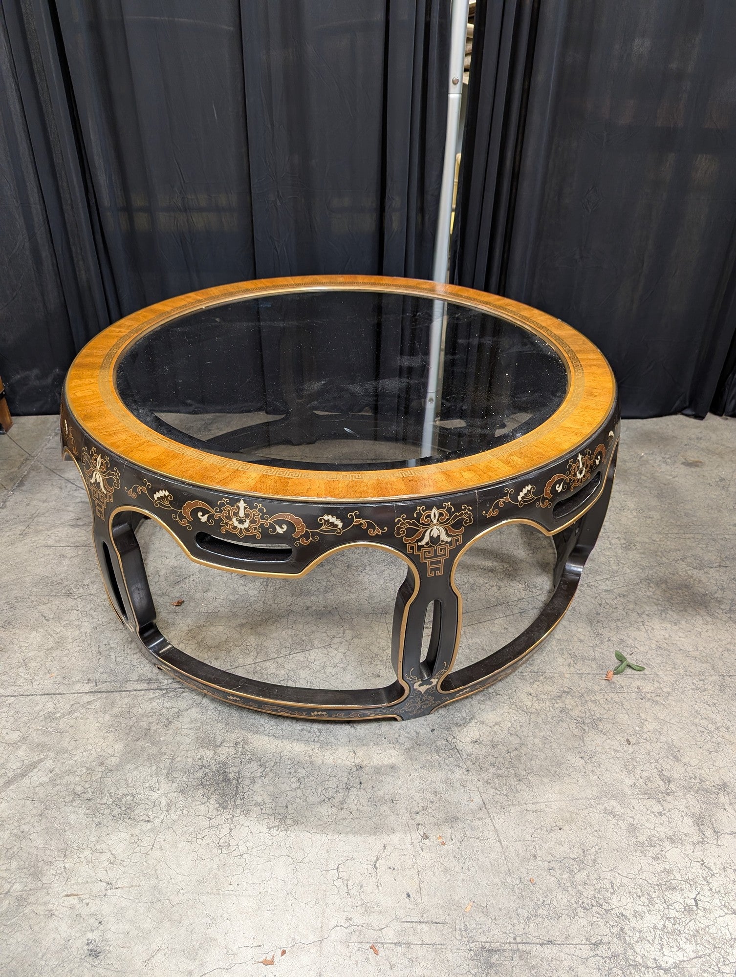 Ornate Black and Gold Round Coffee Table with Glass Top