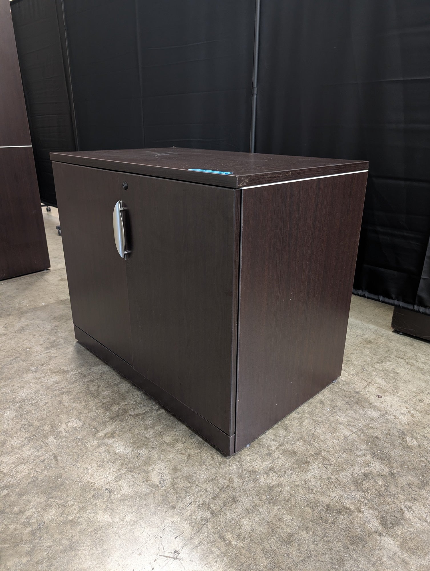 Dark Brown Two-Door Storage Cabinet with Missing Key