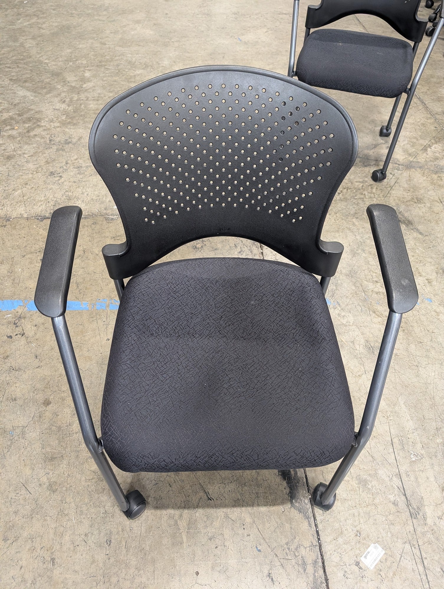 Black Rolling Office Chair with Perforated Back