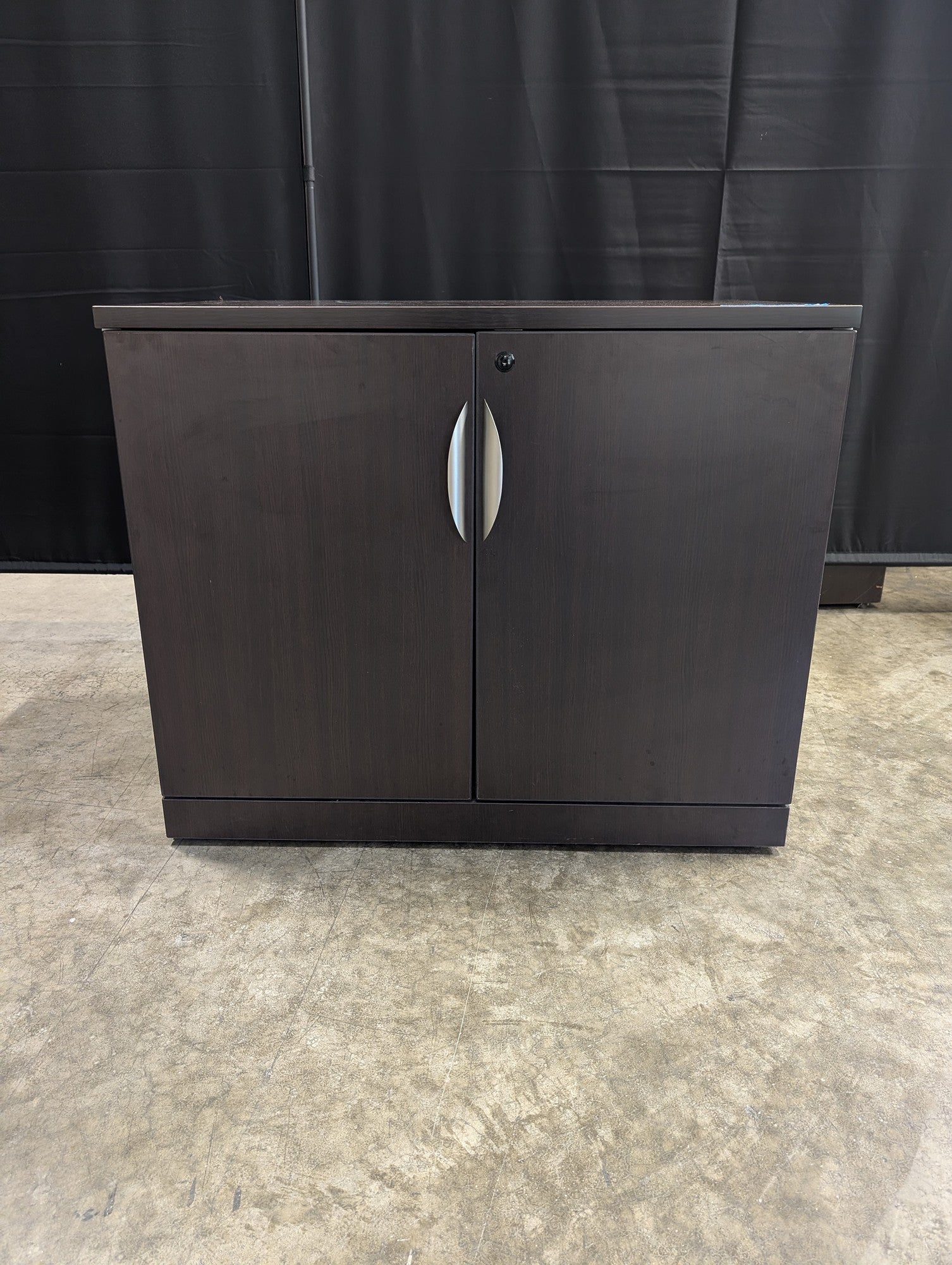 Dark Brown Two-Door Storage Cabinet with Missing Key