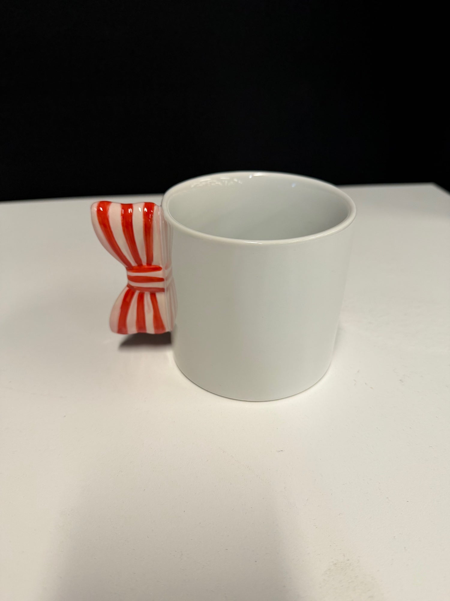 SPR!TZ White Stoneware Mug with Red Bow Handle