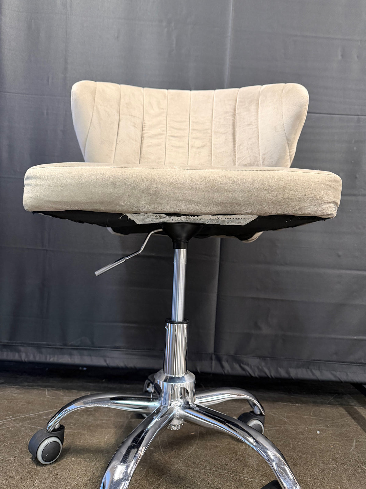 Beige Upholstered Swivel Office Chair with Chrome Base