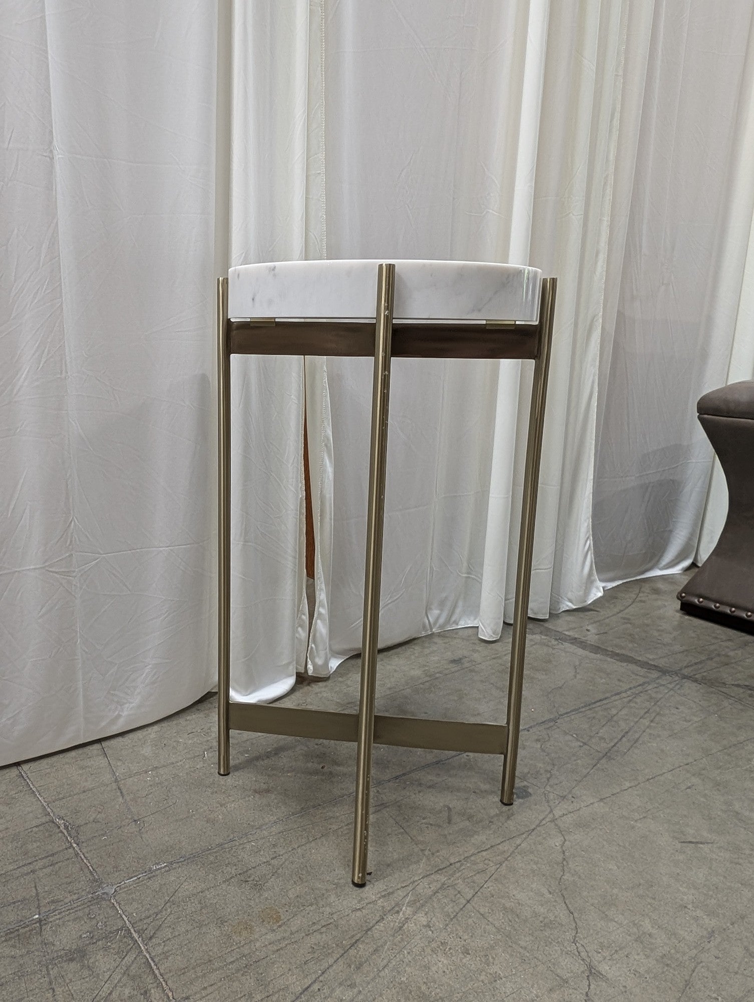 CB2 Round Metal End Table in White Marble