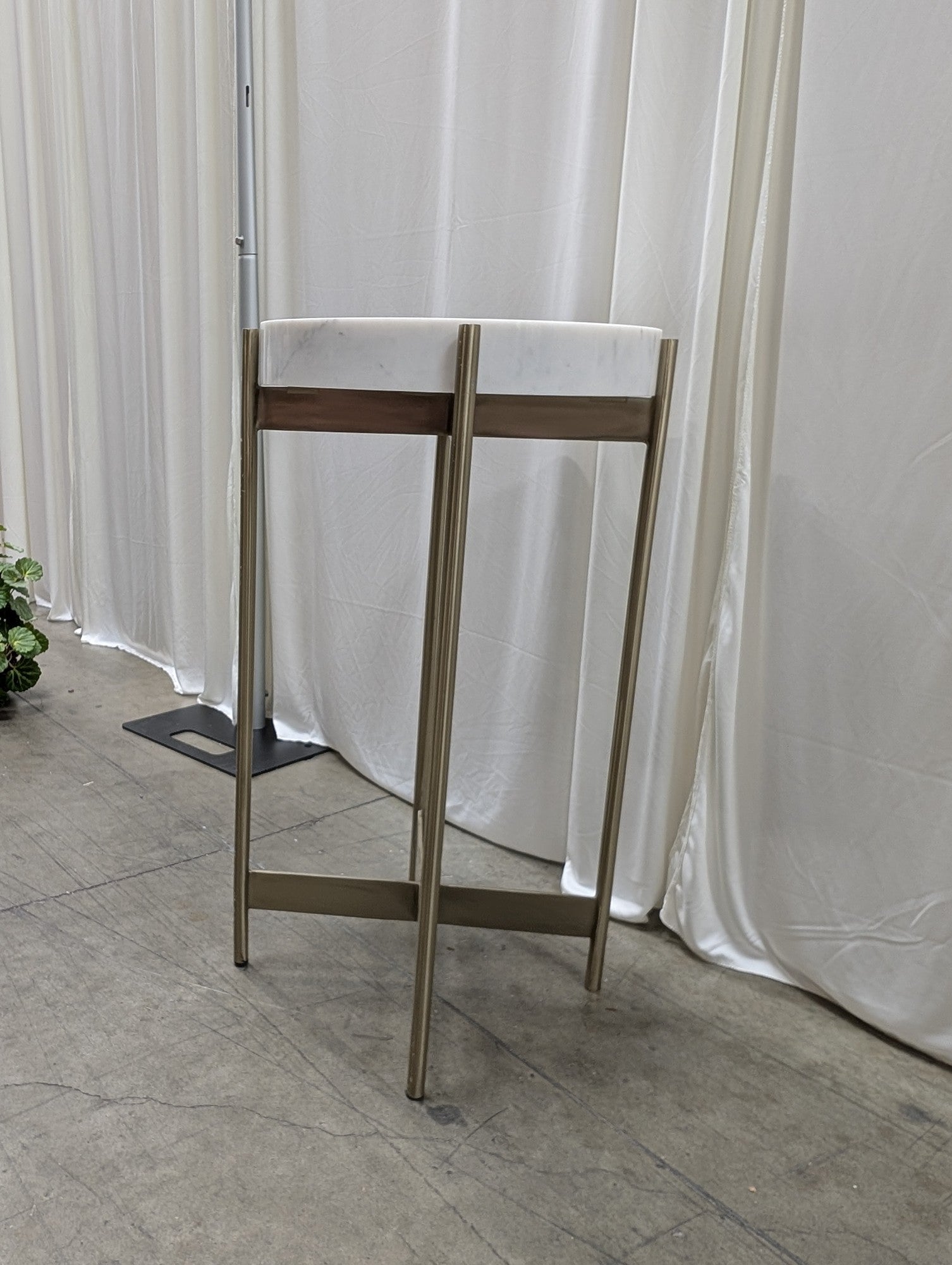 CB2 Round Metal End Table in White Marble