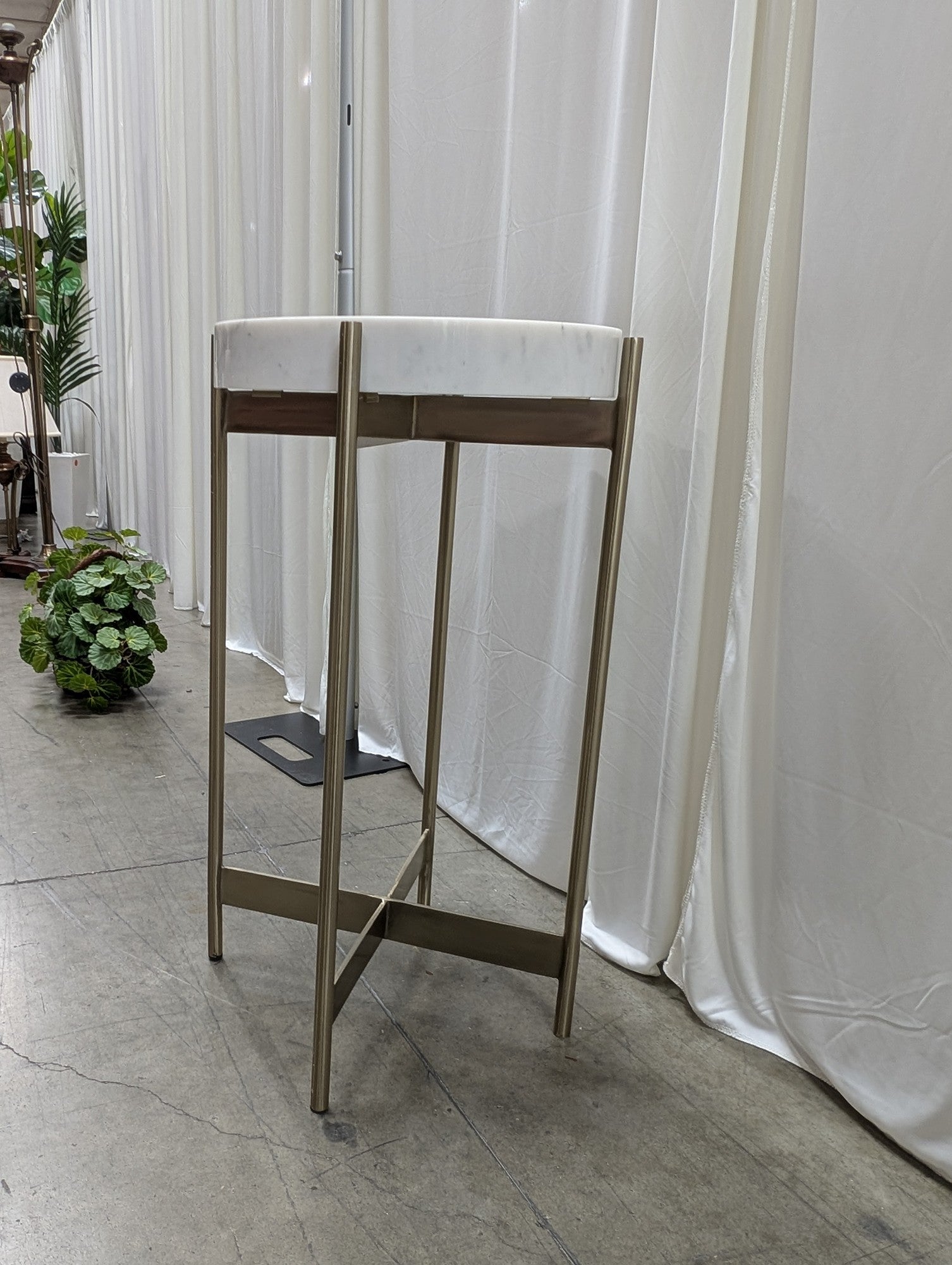 CB2 Round Metal End Table in White Marble