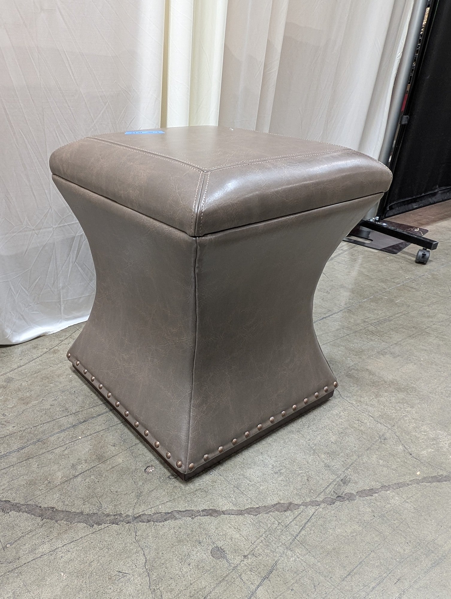Taupe Faux Leather Ottoman with Nailhead Trim