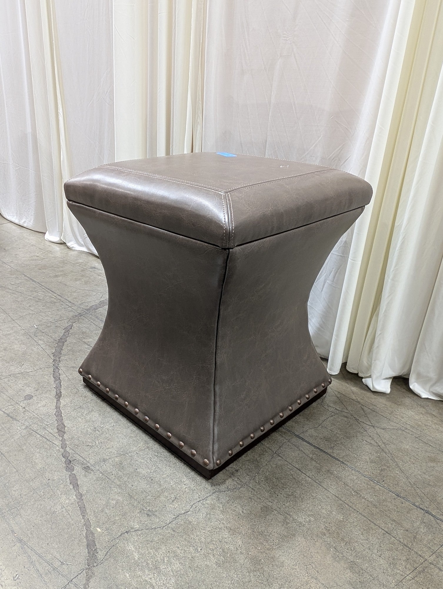 Taupe Faux Leather Ottoman with Nailhead Trim