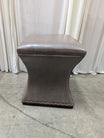Taupe Faux Leather Ottoman with Nailhead Trim