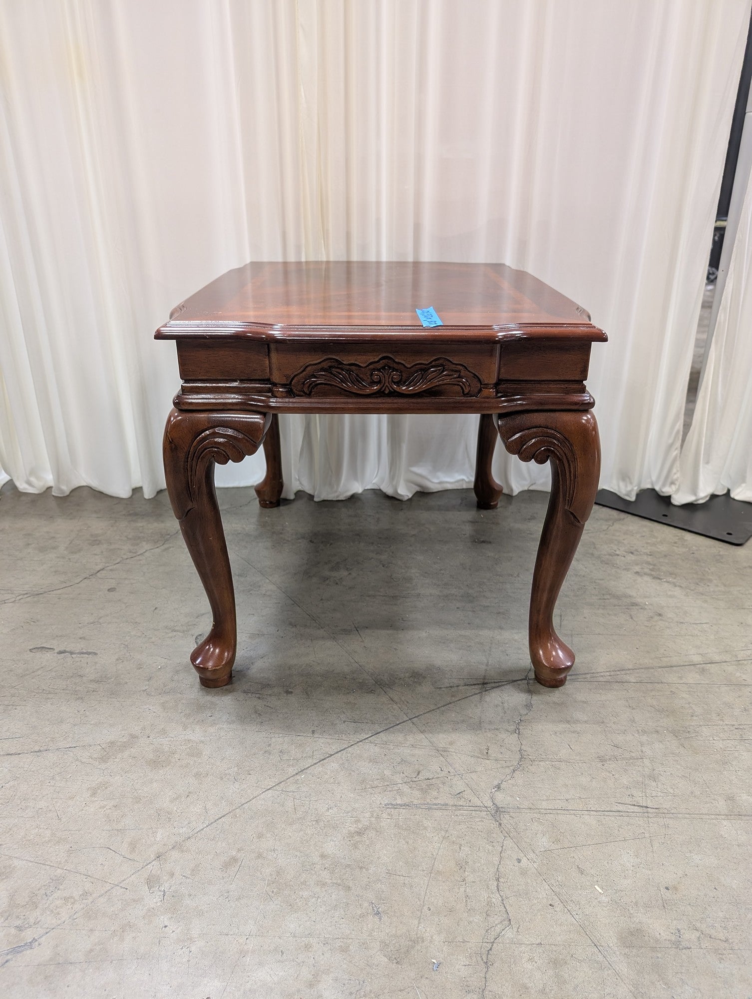Traditional Dark Wood End Table with Carved Details