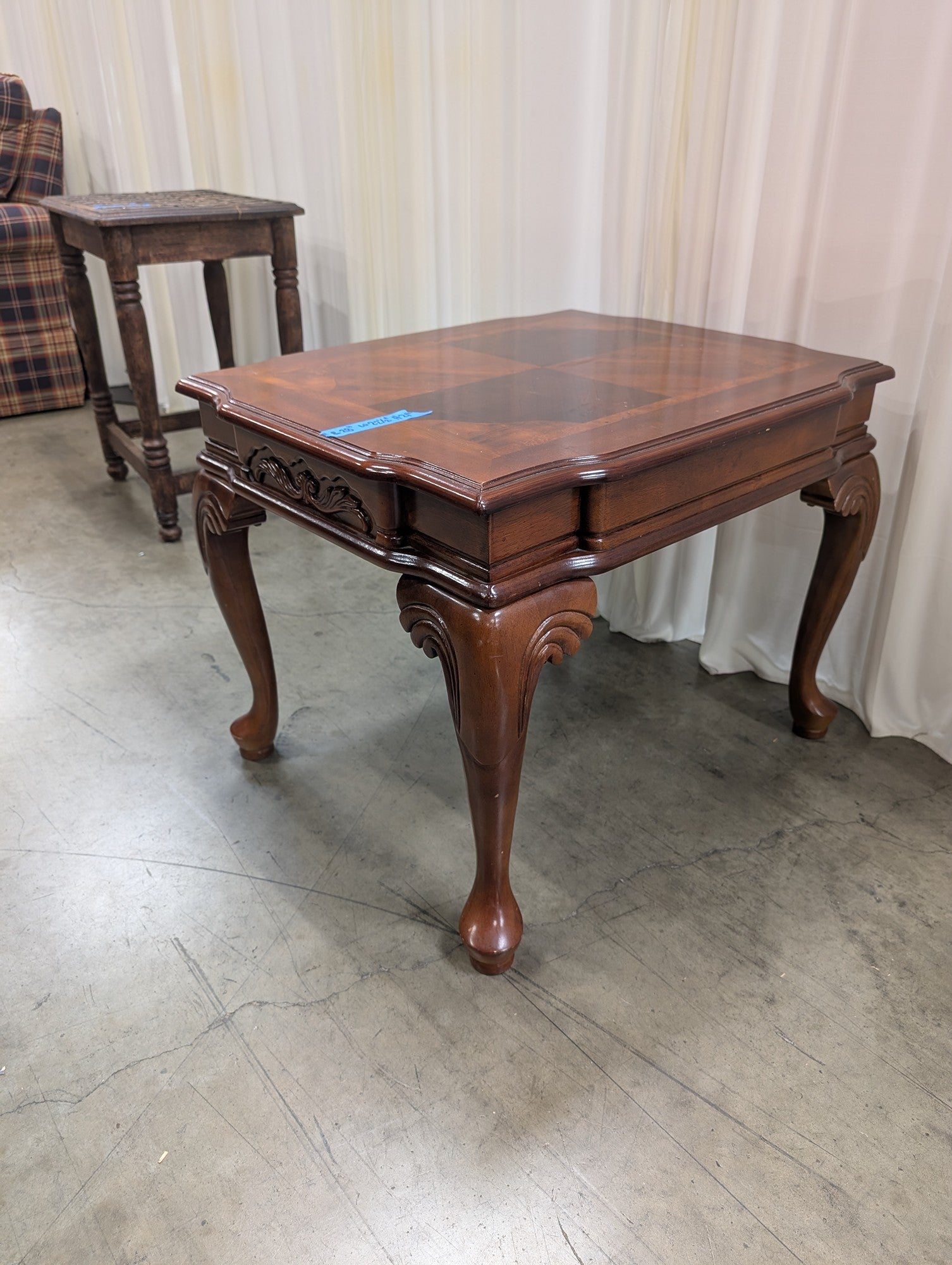 Traditional Dark Wood End Table with Carved Details