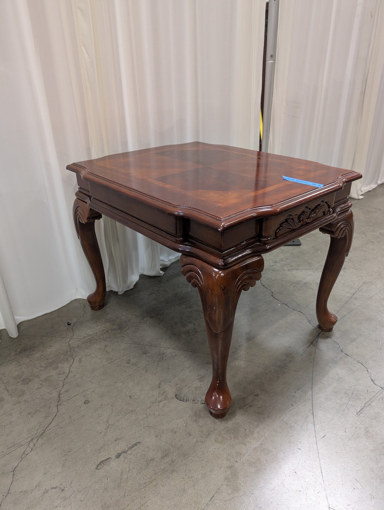 Traditional Dark Wood End Table with Carved Details
