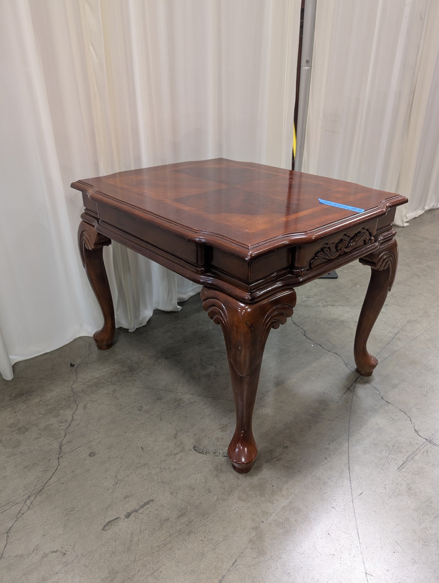 Traditional Dark Wood End Table with Carved Details