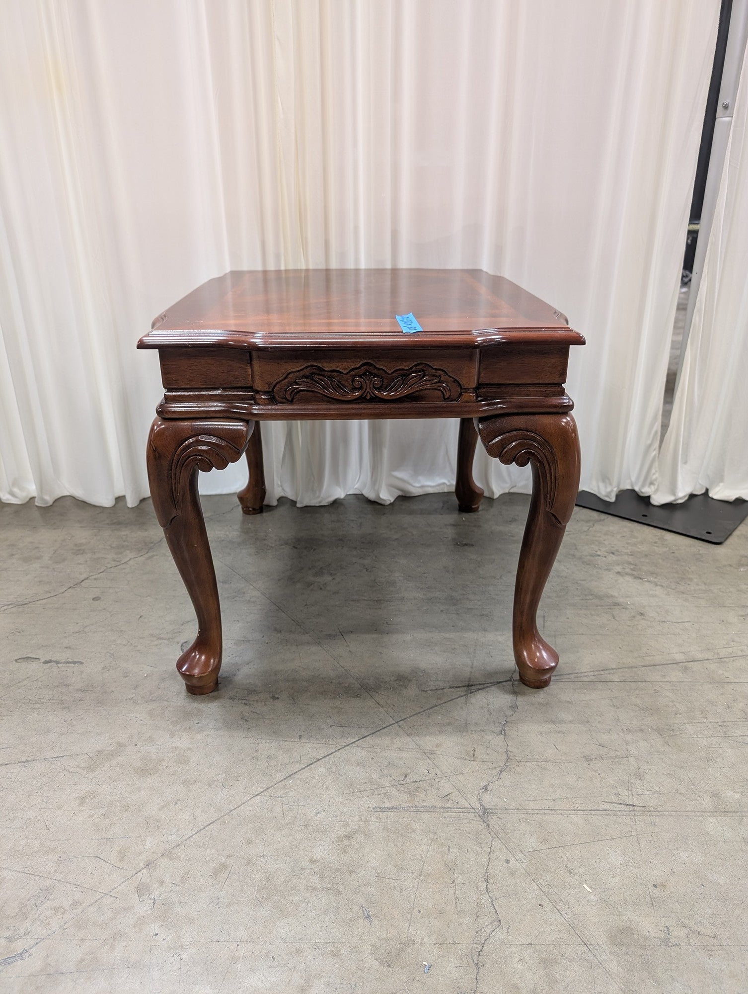 Traditional Dark Wood End Table with Carved Details