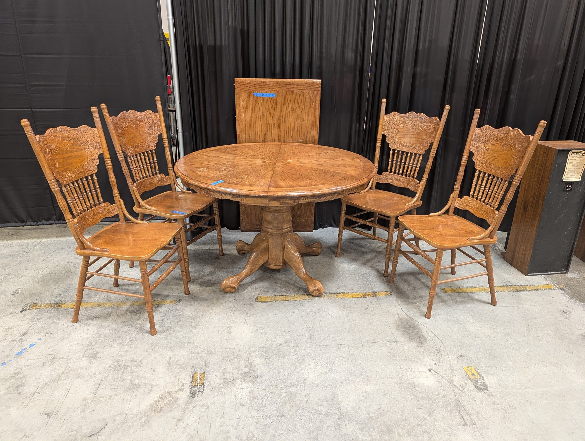 Oak-Tone Pedestal Wood Dining Table with Four Carved Chairs