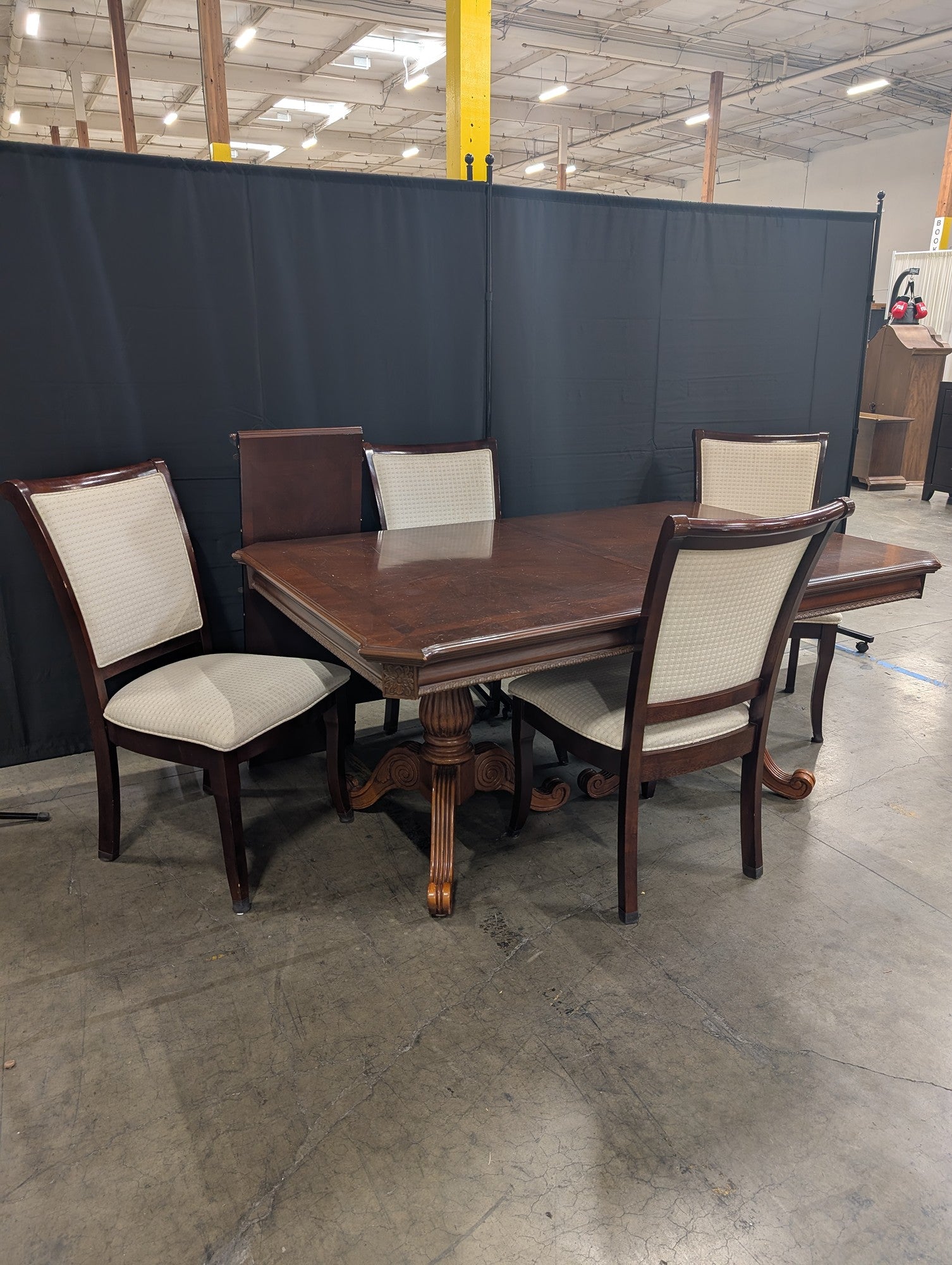 Ornate Dark Wood Pedestal Dining Table with Upholstered Chairs