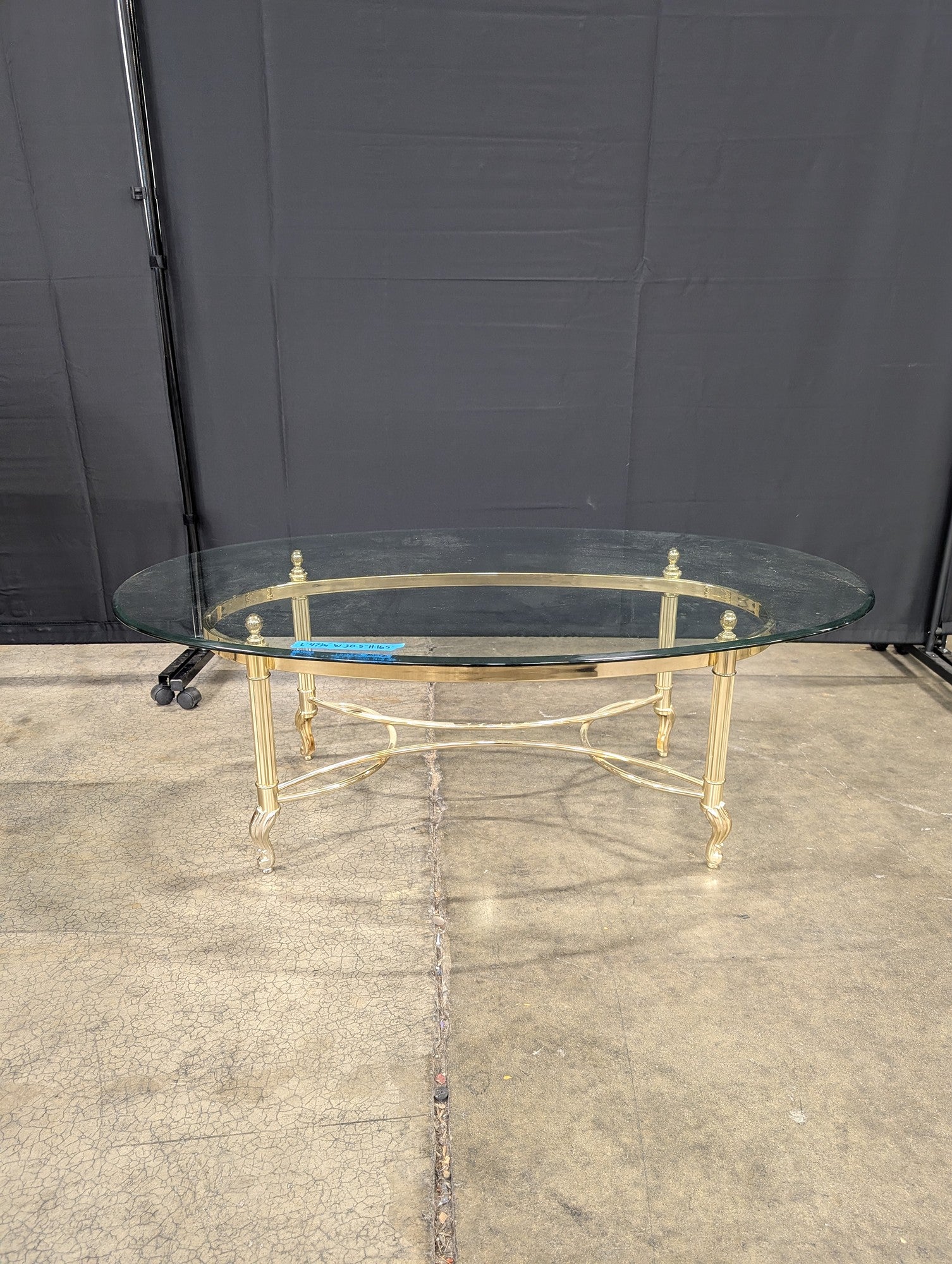 Oval Glass Coffee Table with Brass Legs