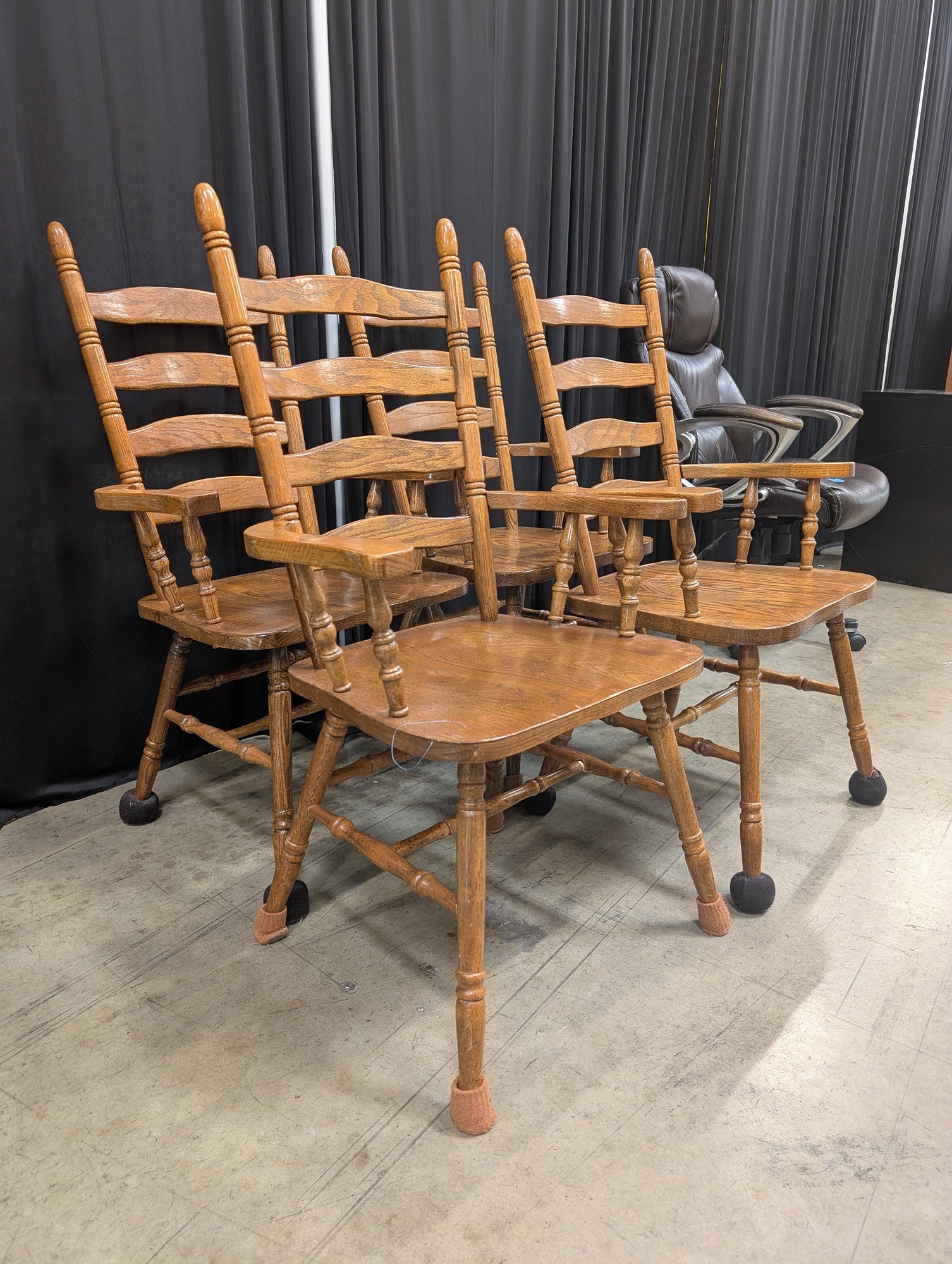 Set of Four Golden Oak Ladderback Dining Chairs with Arms
