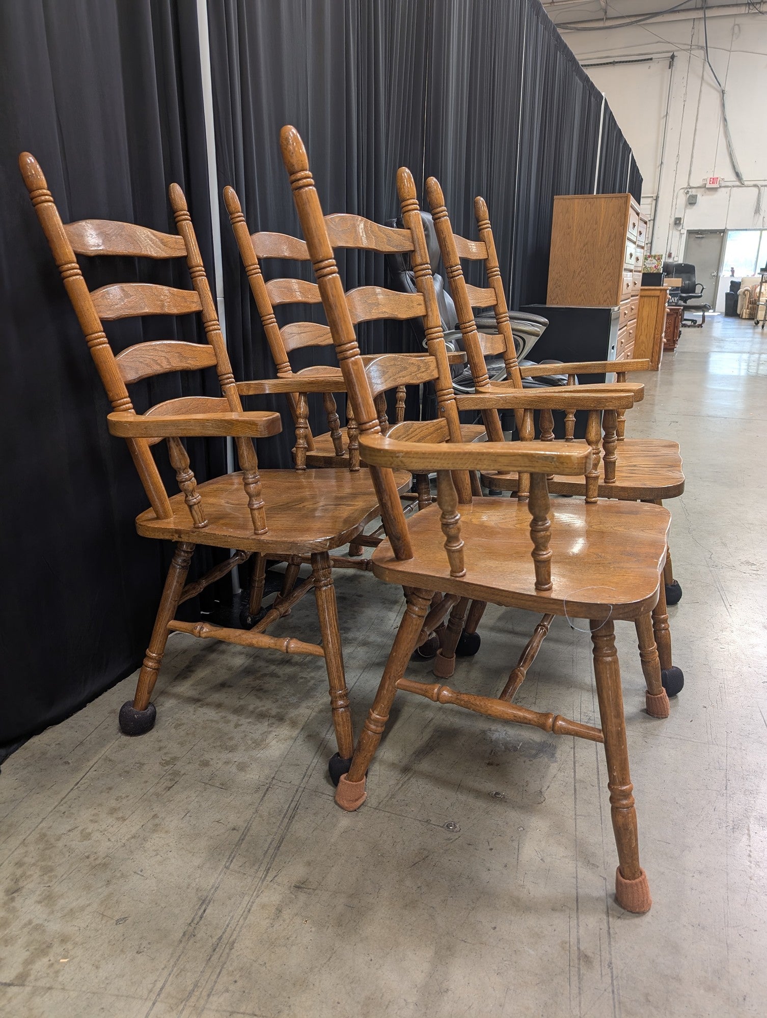 Set of Four Golden Oak Ladderback Dining Chairs with Arms