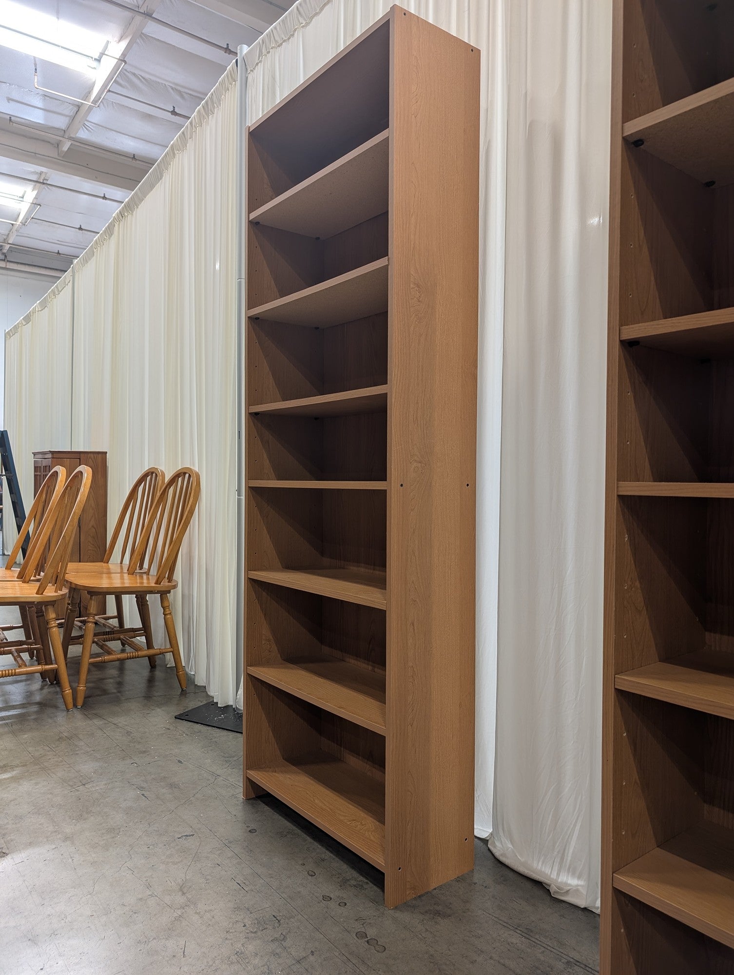 Light Brown Wood Grain Bookcase with Adjustable Shelves