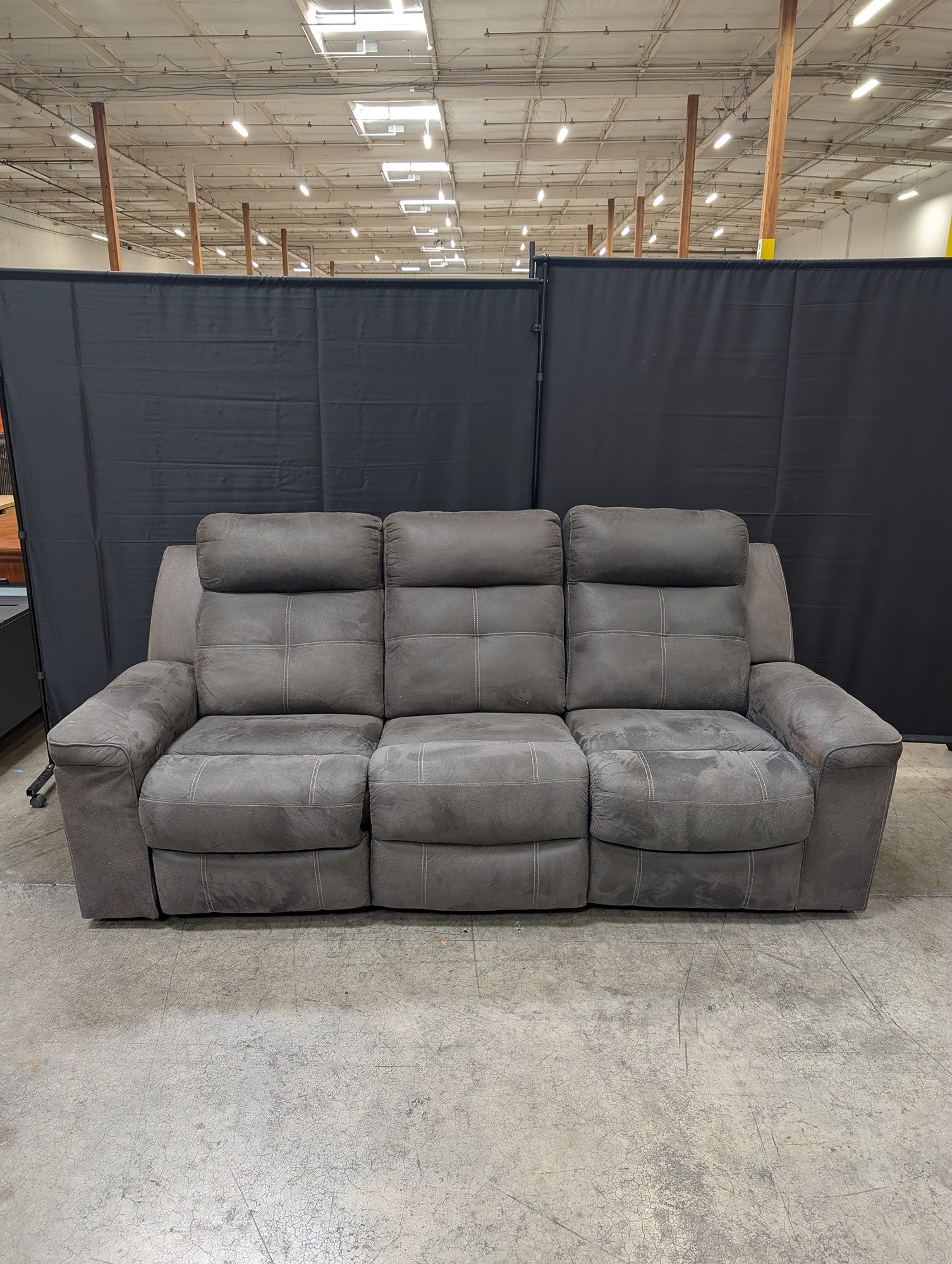 Textured Grey Reclining Three-Seat Couch
