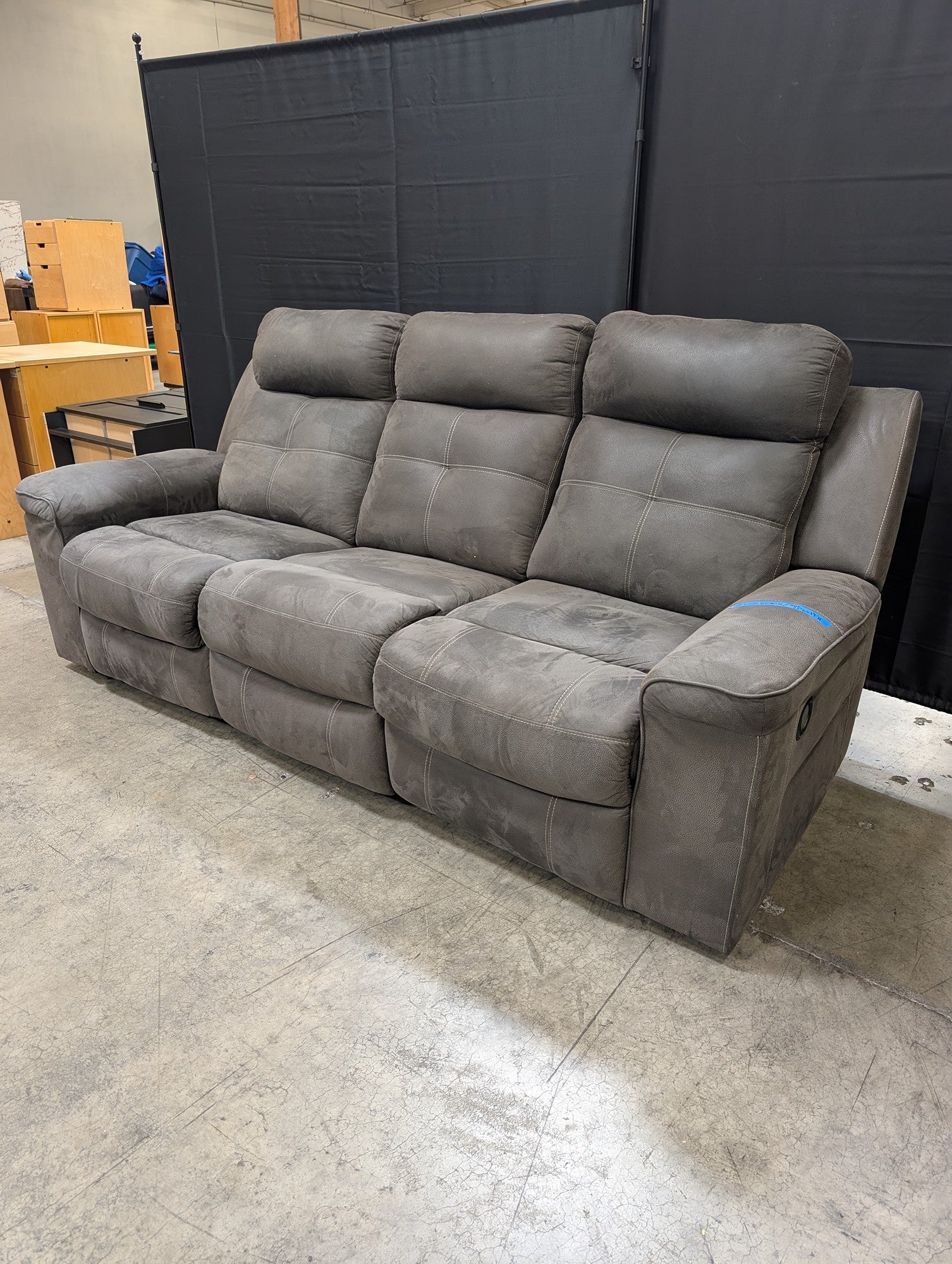 Textured Grey Reclining Three-Seat Couch