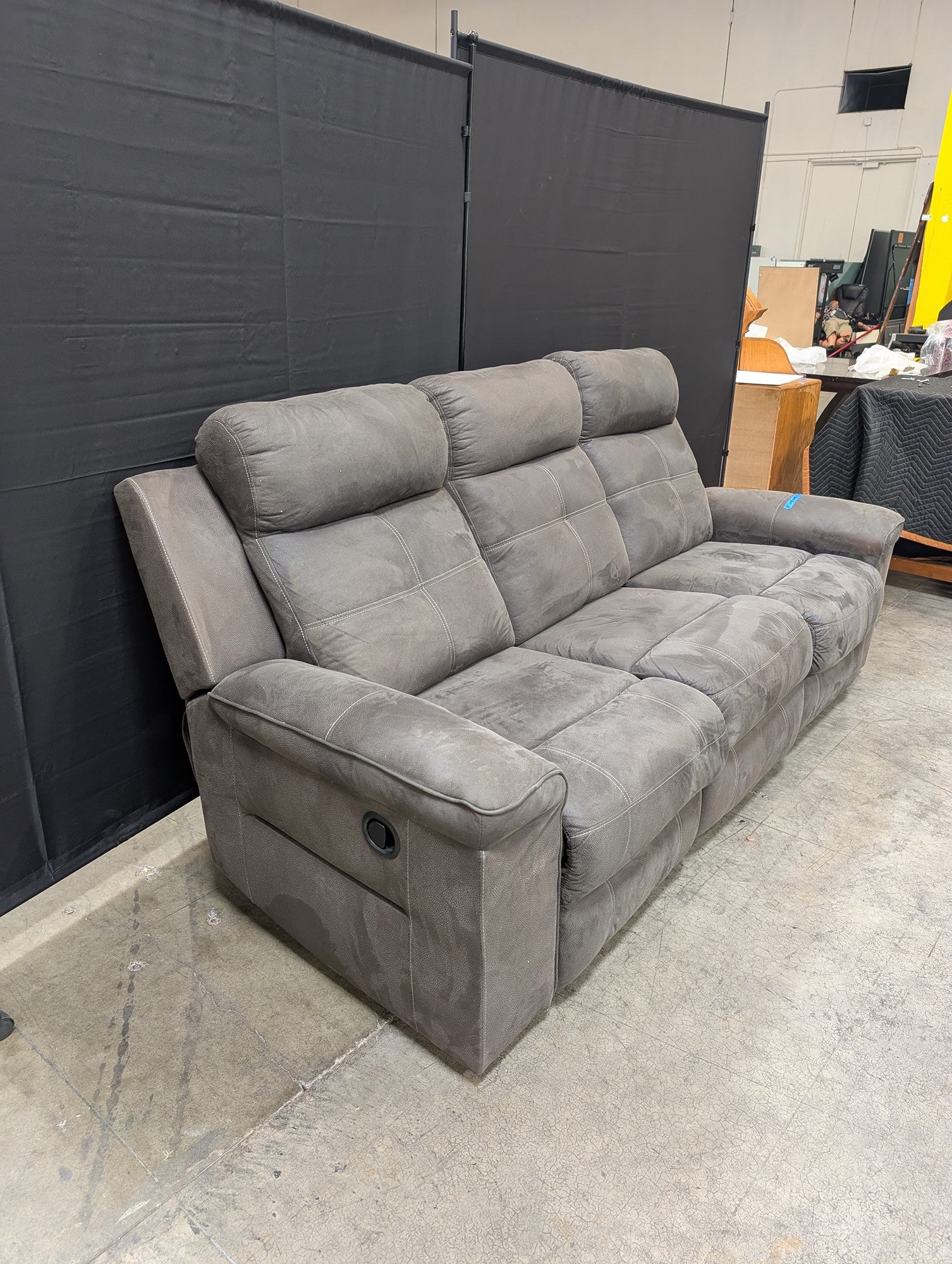 Textured Grey Reclining Three-Seat Couch