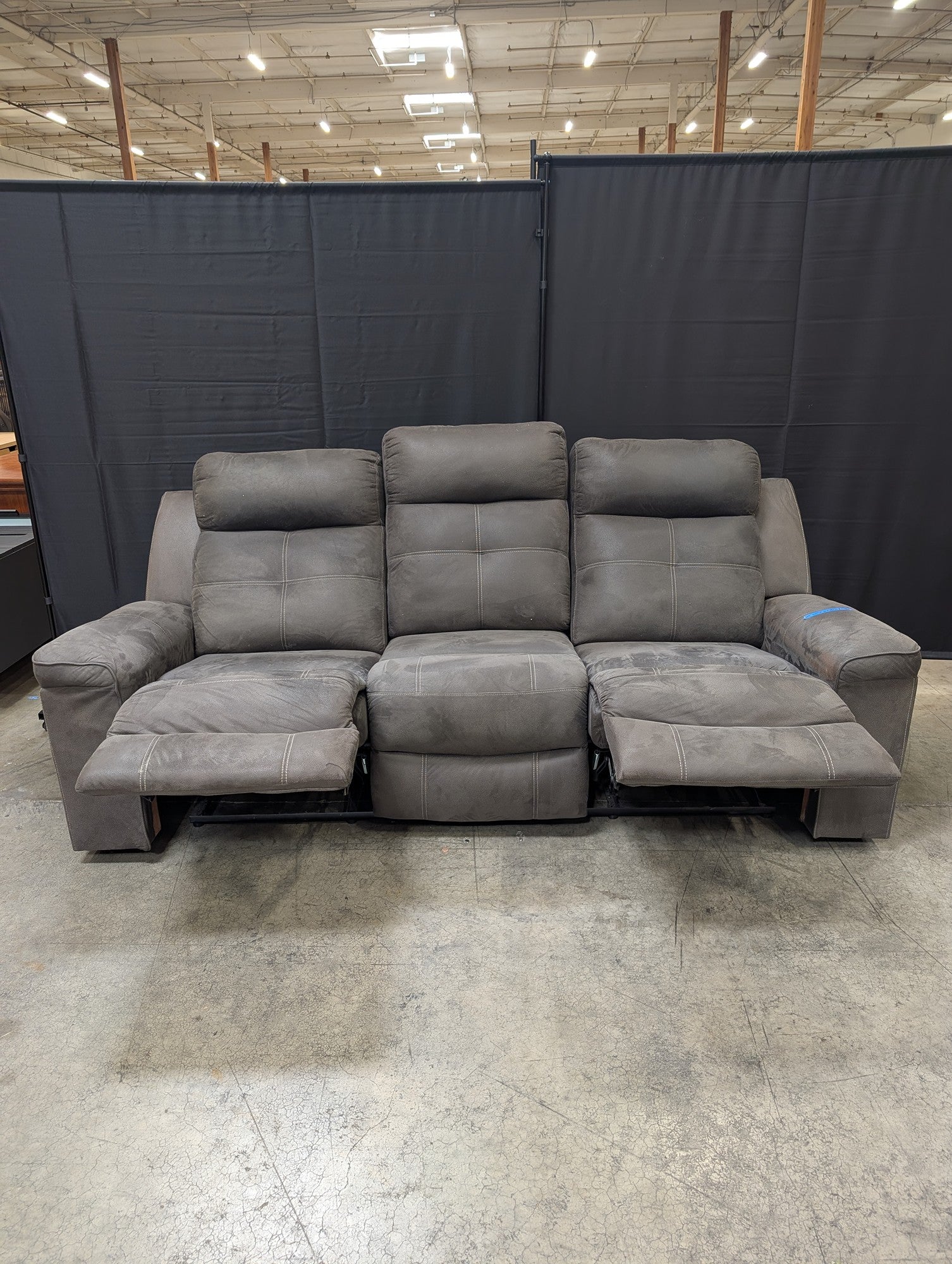 Textured Grey Reclining Three-Seat Couch