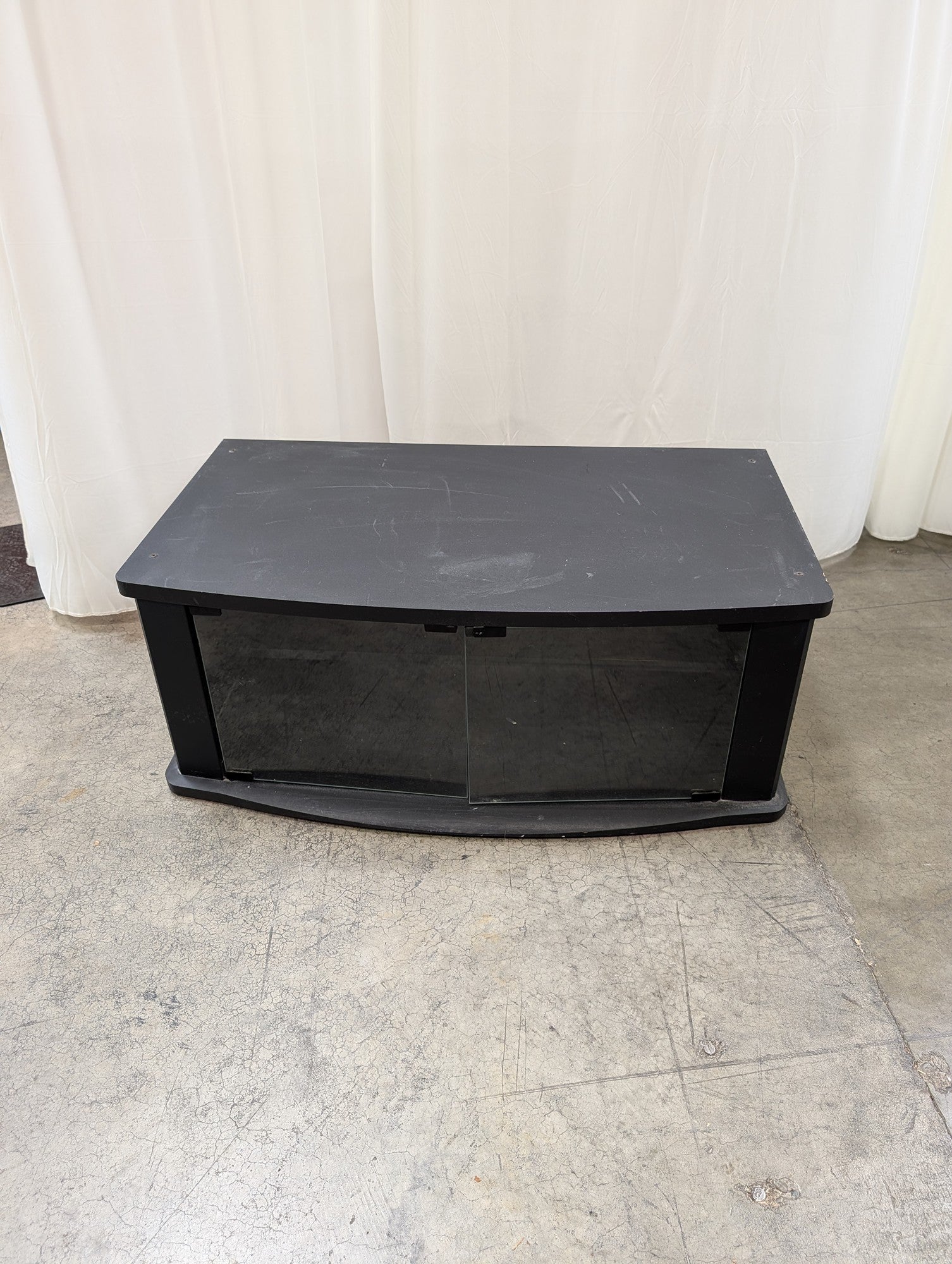 Black Wood Composite Curved Front TV Stand with Glass Doors