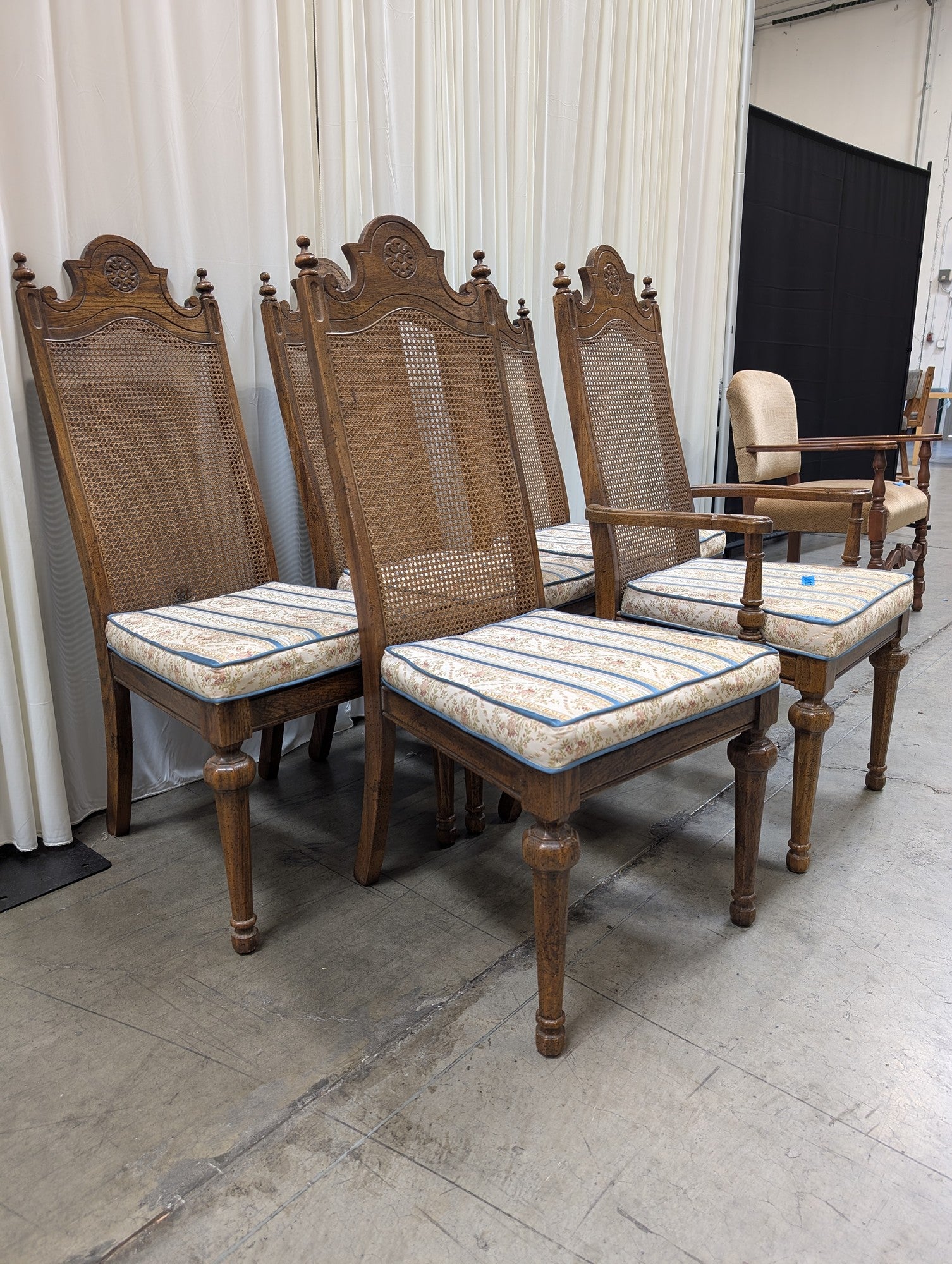 Set of Five American Street Furniture Carved Wood Dining Chairs with Cane Backs