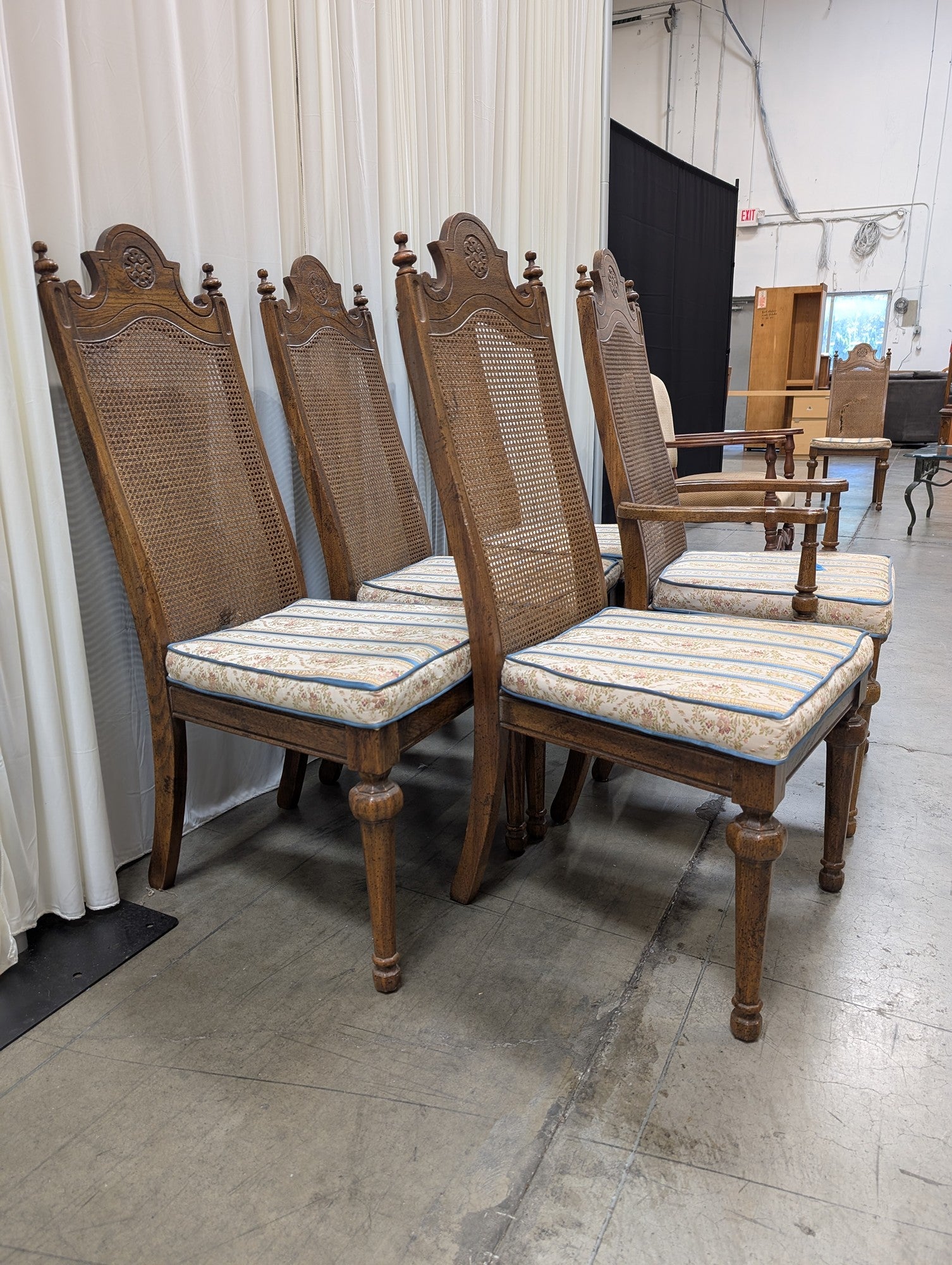 Set of Five American Street Furniture Carved Wood Dining Chairs with Cane Backs
