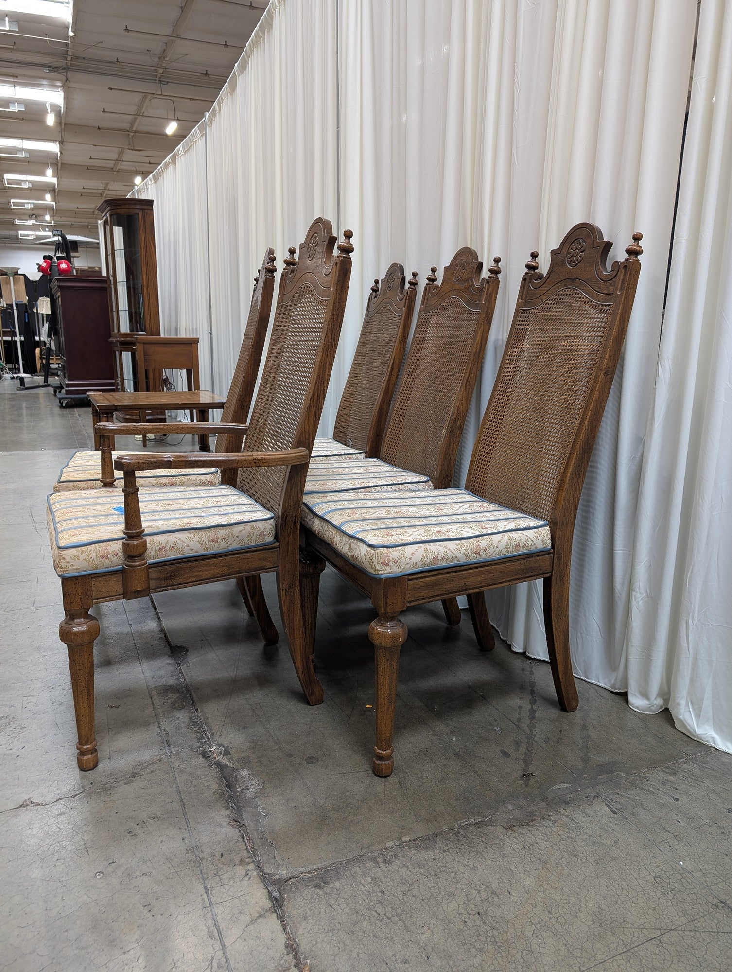 Set of Five American Street Furniture Carved Wood Dining Chairs with Cane Backs