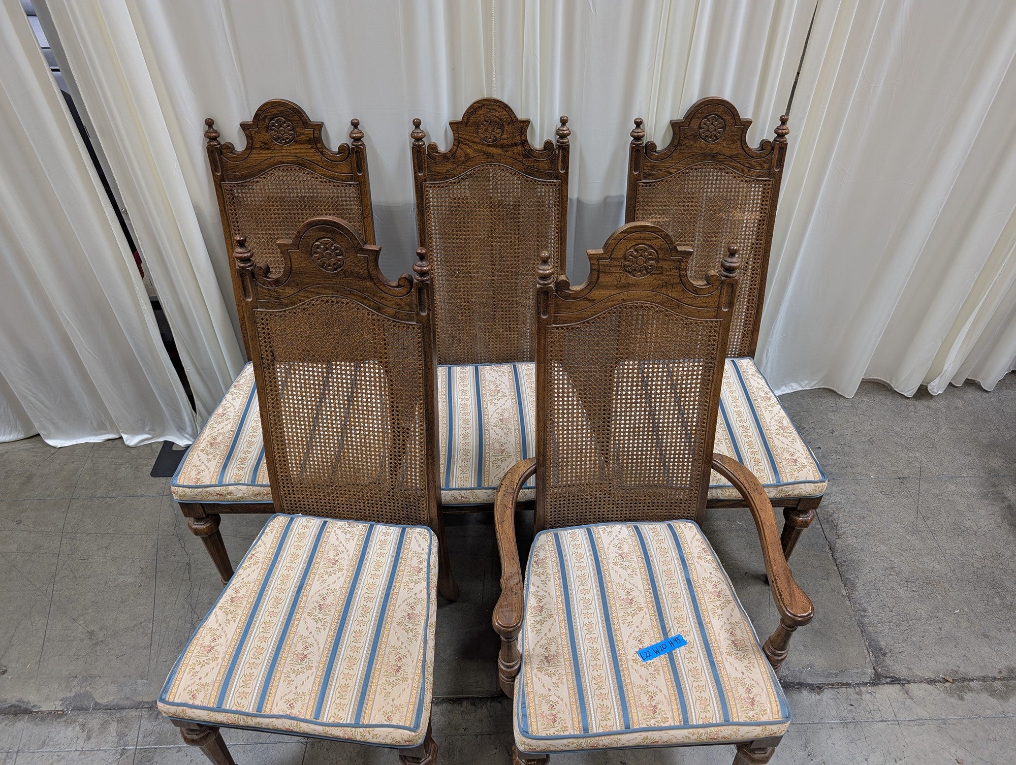 Set of Five American Street Furniture Carved Wood Dining Chairs with Cane Backs
