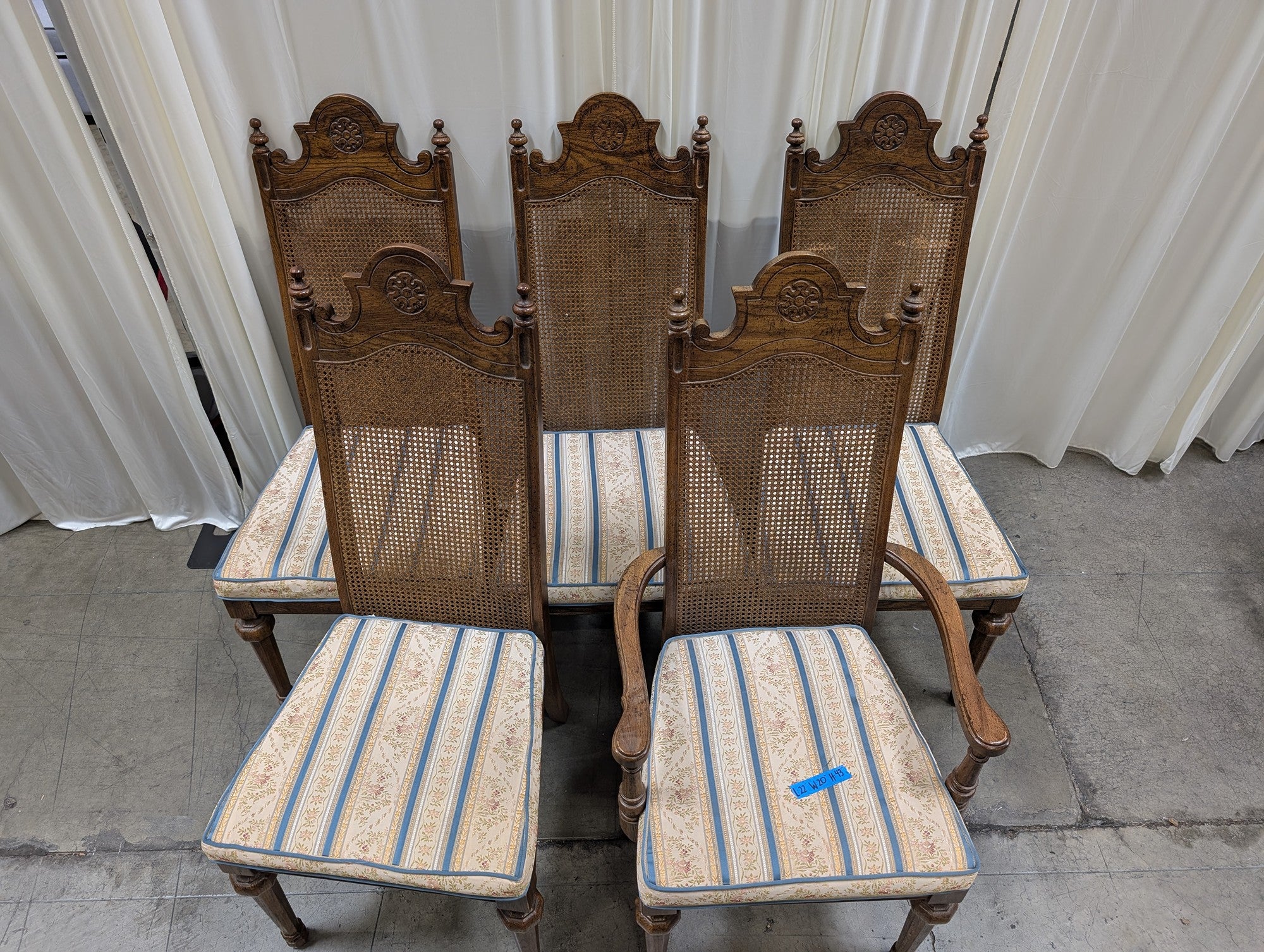 Set of Five American Street Furniture Carved Wood Dining Chairs with Cane Backs